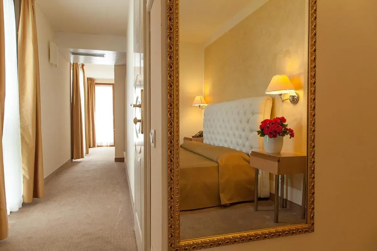 Triple Room with Terrace and Partial Lake View in Hotel Dependance Silvestro Triple Room with Terrace and Partial Lake View in Hotel Dependance Silvestro