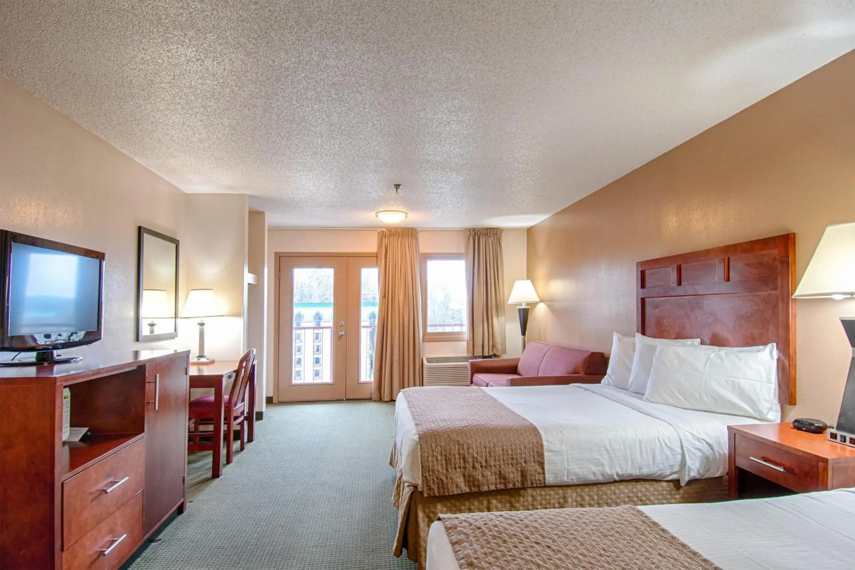 Queen Room with Two Queen Beds and Kitchenette in Park Tower Inn Queen Room with Two Queen Beds and Kitchenette in Park Tower Inn