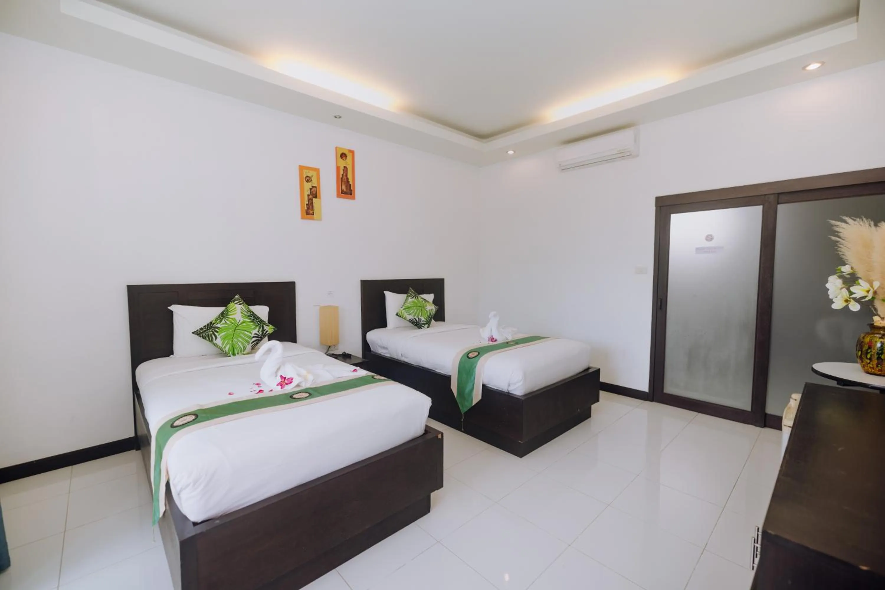 Bed in Phuket Monaburi Boutique Hotel