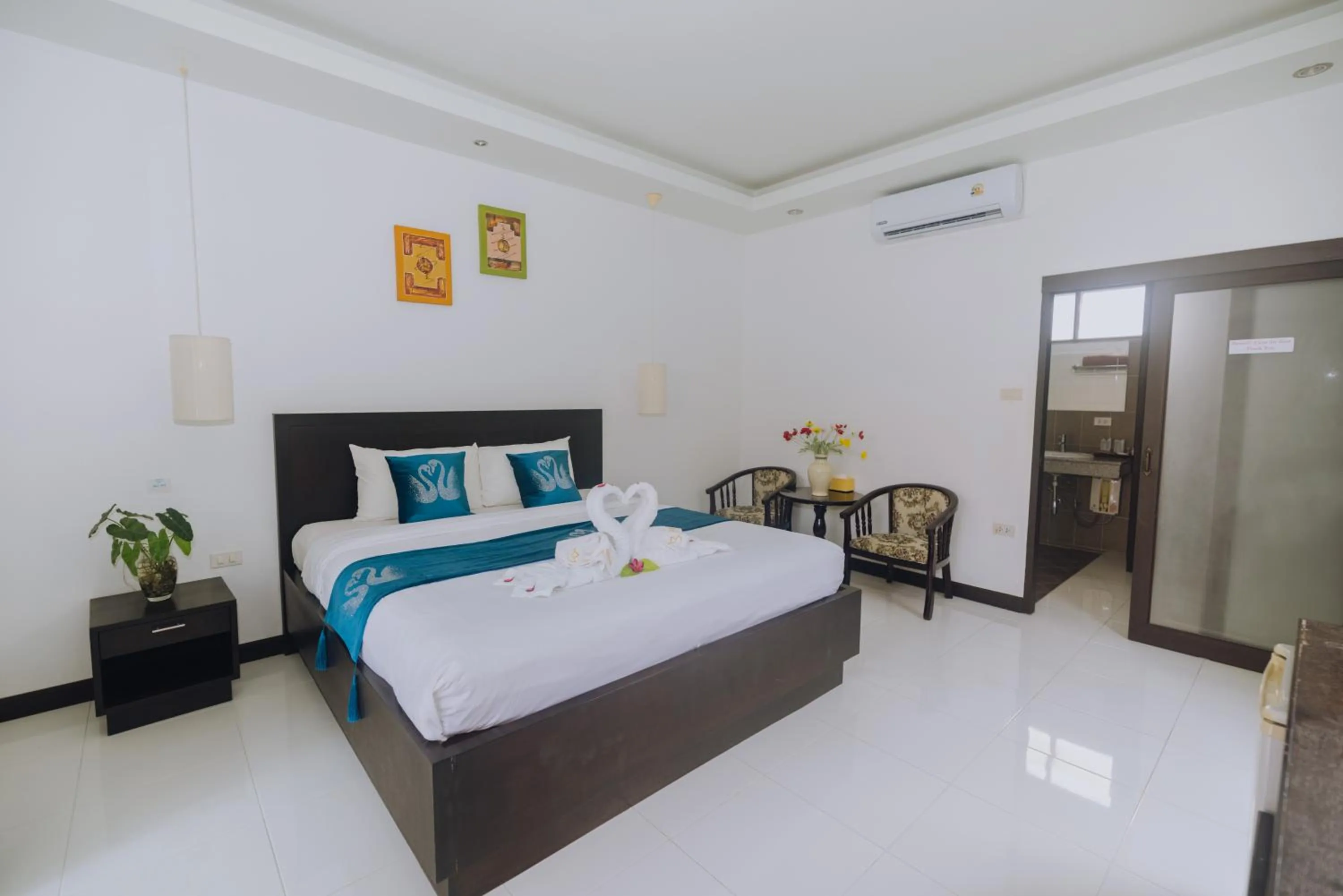 Bed in Phuket Monaburi Boutique Hotel