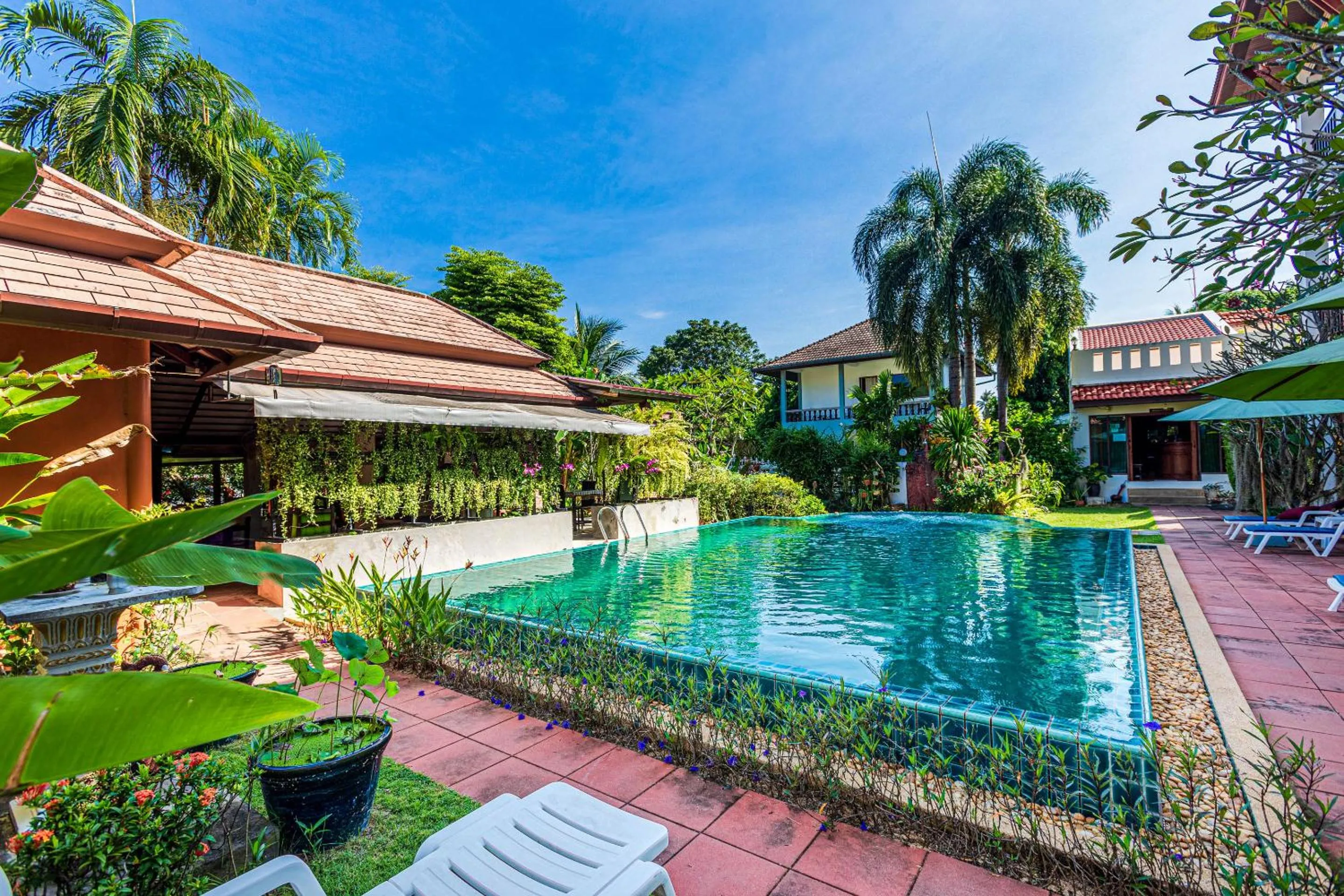 Swimming pool in Phuket Monaburi Boutique Hotel