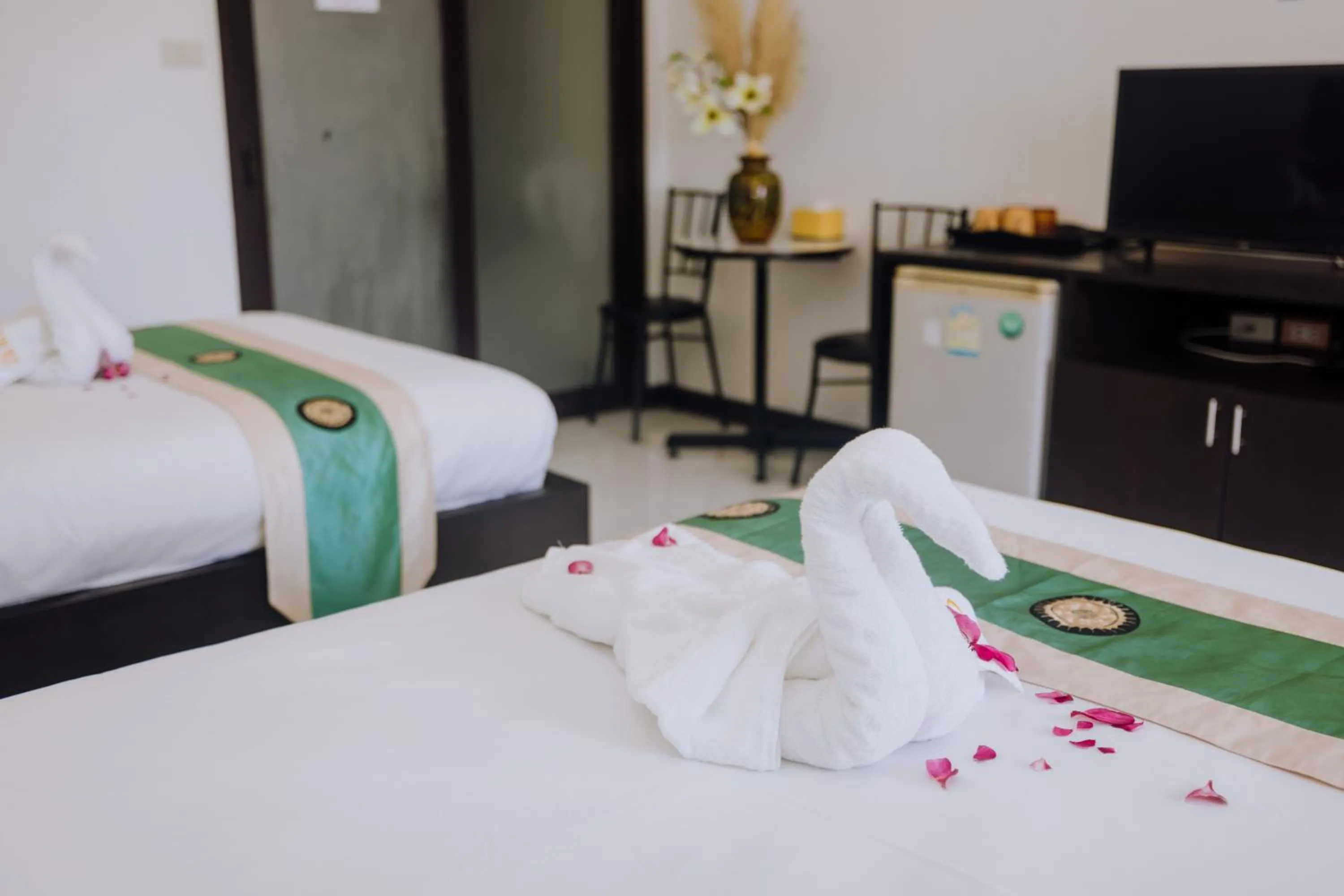 Bed in Phuket Monaburi Boutique Hotel