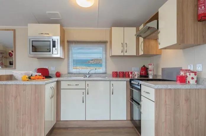 Kitchen or kitchenette in Cardigan Bay Holiday Park