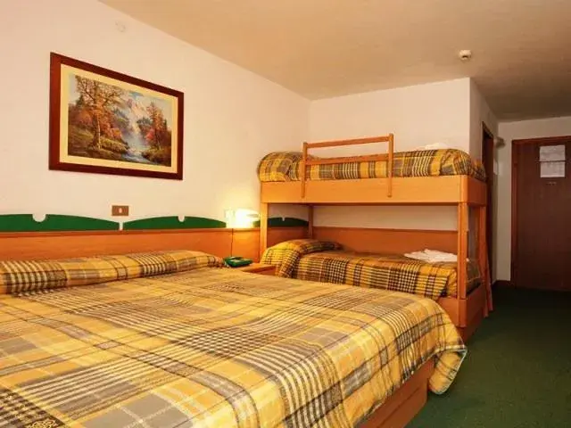 Quadruple Room in Sport Hotel Pampeago Quadruple Room in Sport Hotel Pampeago