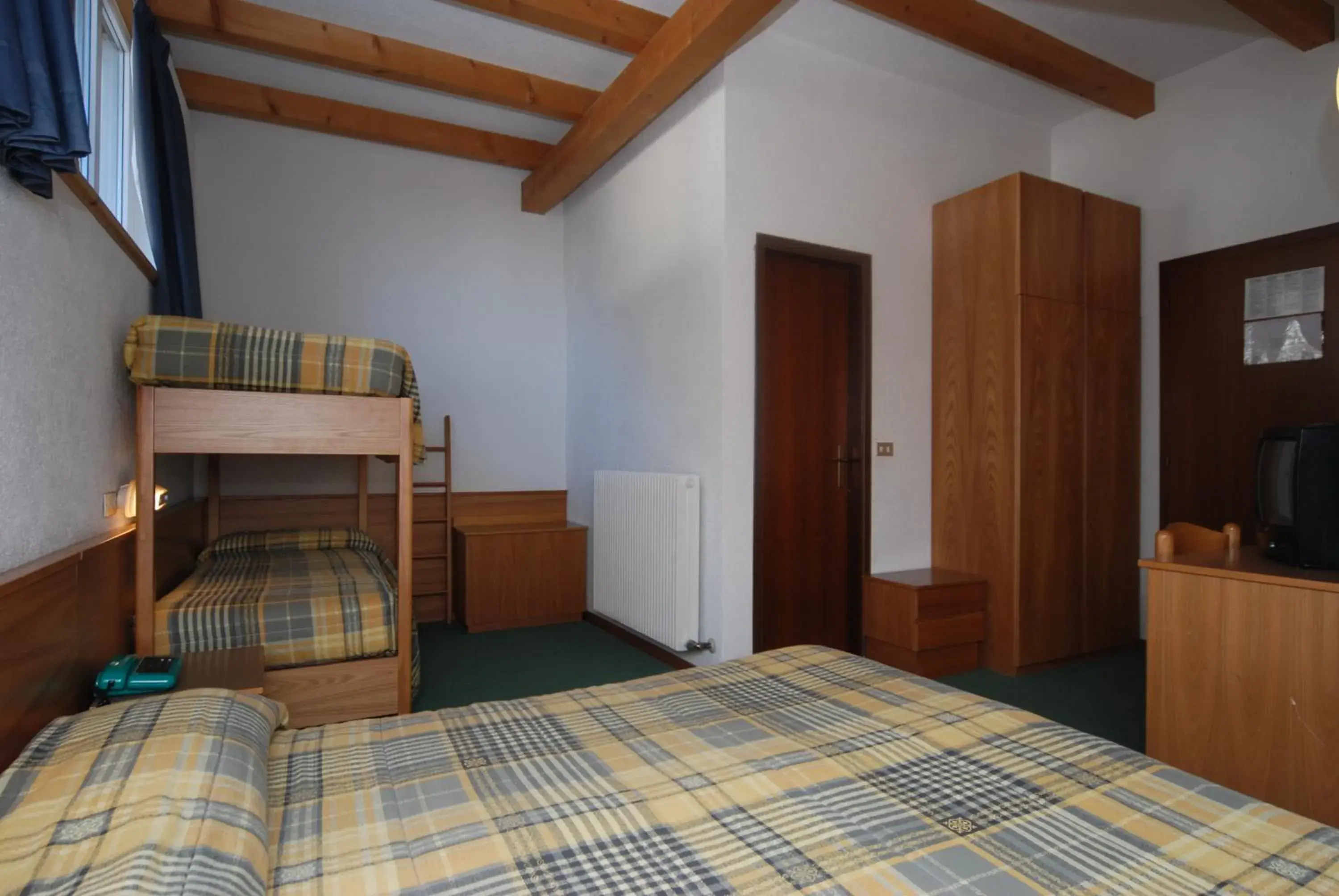 Quadruple Room in Sport Hotel Pampeago Quadruple Room in Sport Hotel Pampeago