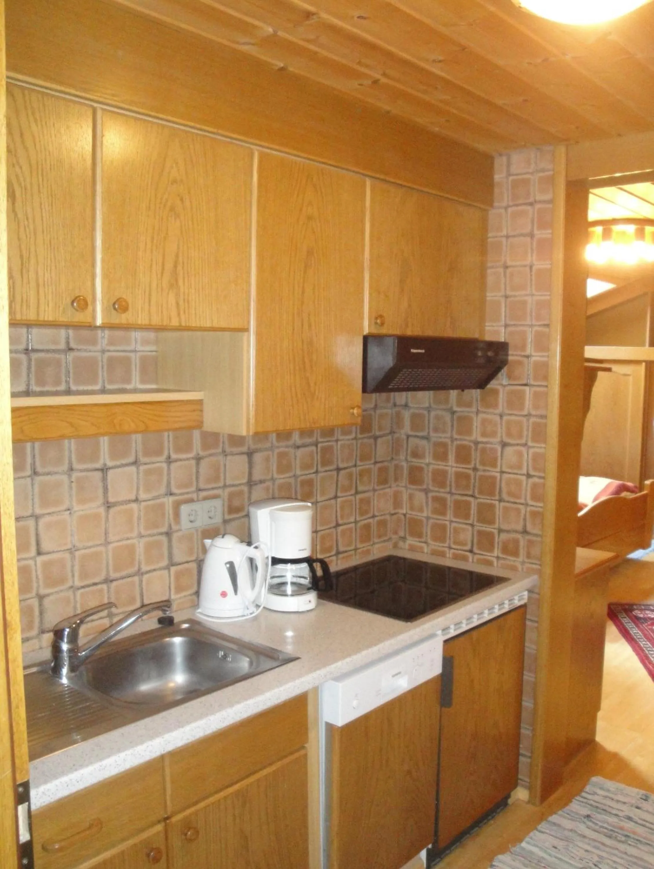 Kitchen or kitchenette in Pension & Appartement Steinwender