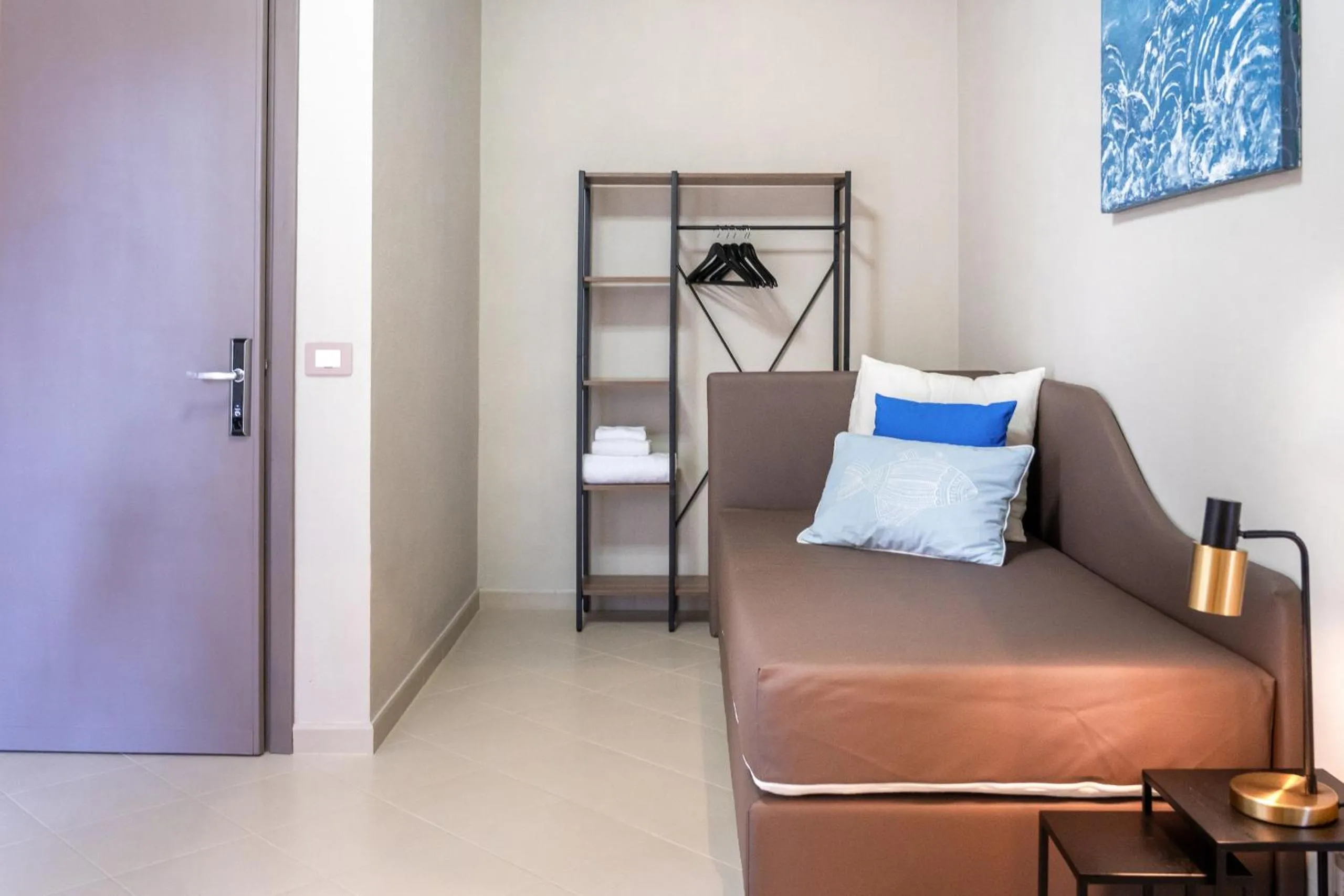 Seating area, Bed in Hotel Baia di Talamone