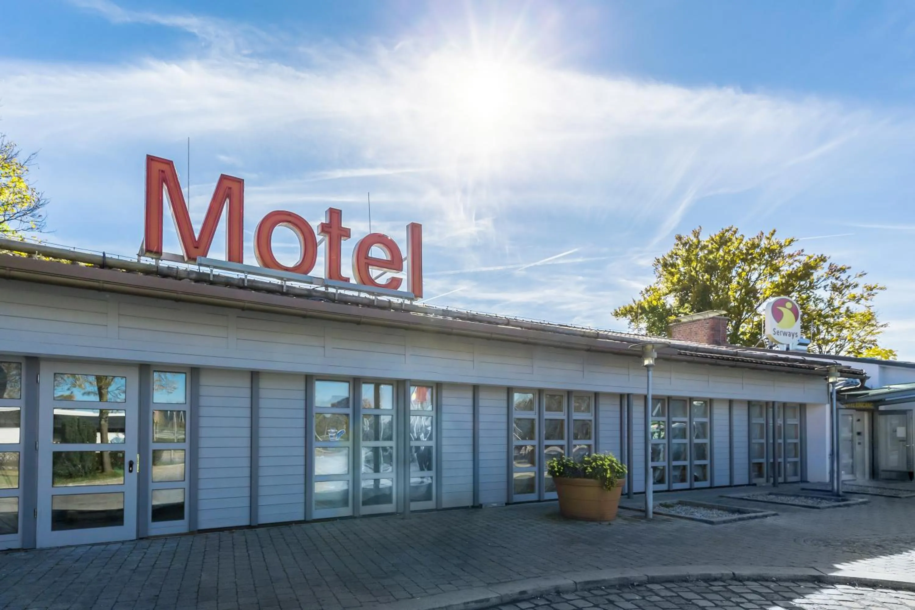 Property logo or sign in Coffee Fellows Hotel Irschenberg Süd