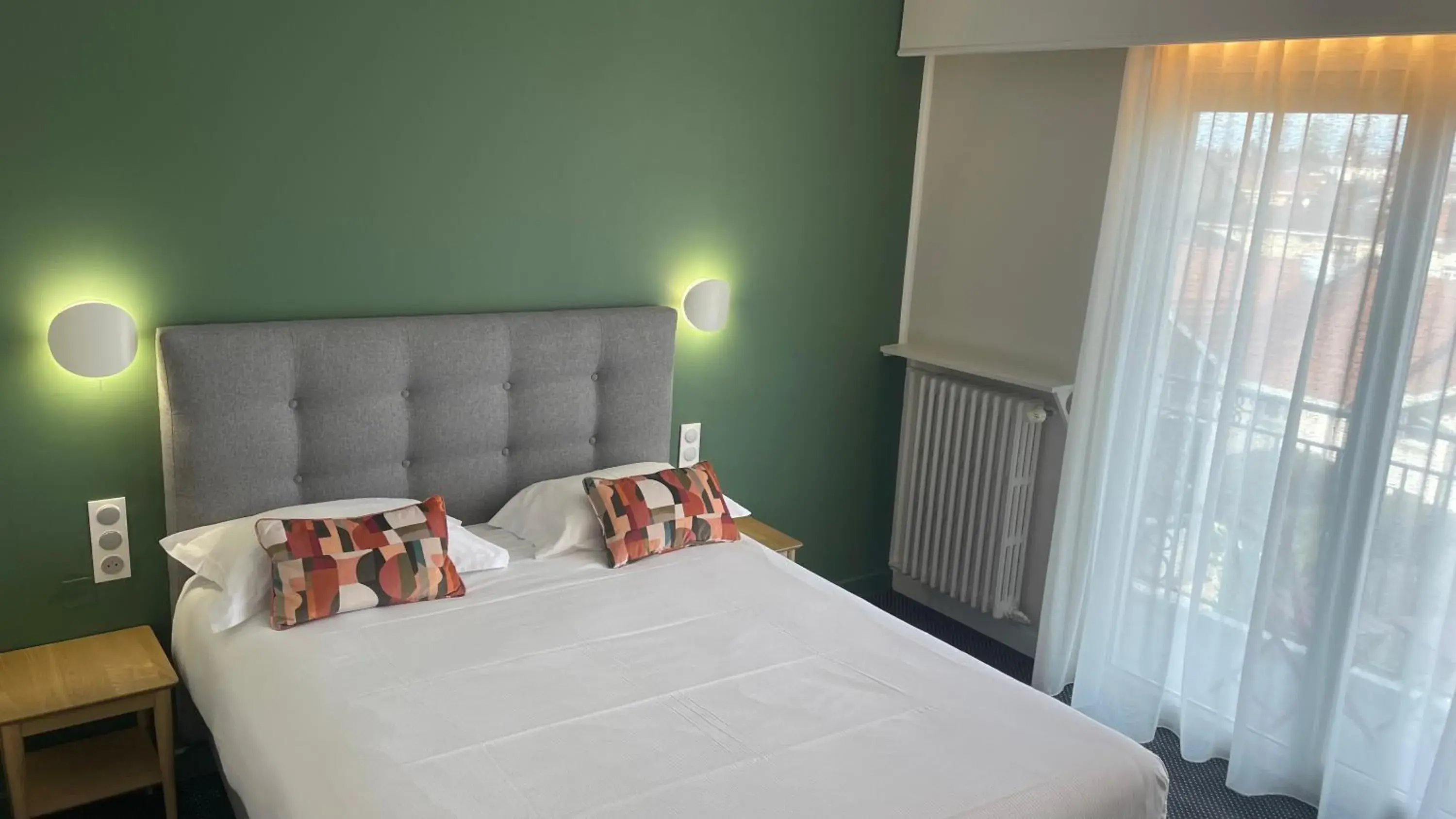 Bedroom, Bed in Cit'Hotel Logis De Brou, Bourg en Bresse Bedroom, Bed in Cit'Hotel Logis De Brou, Bourg en Bresse