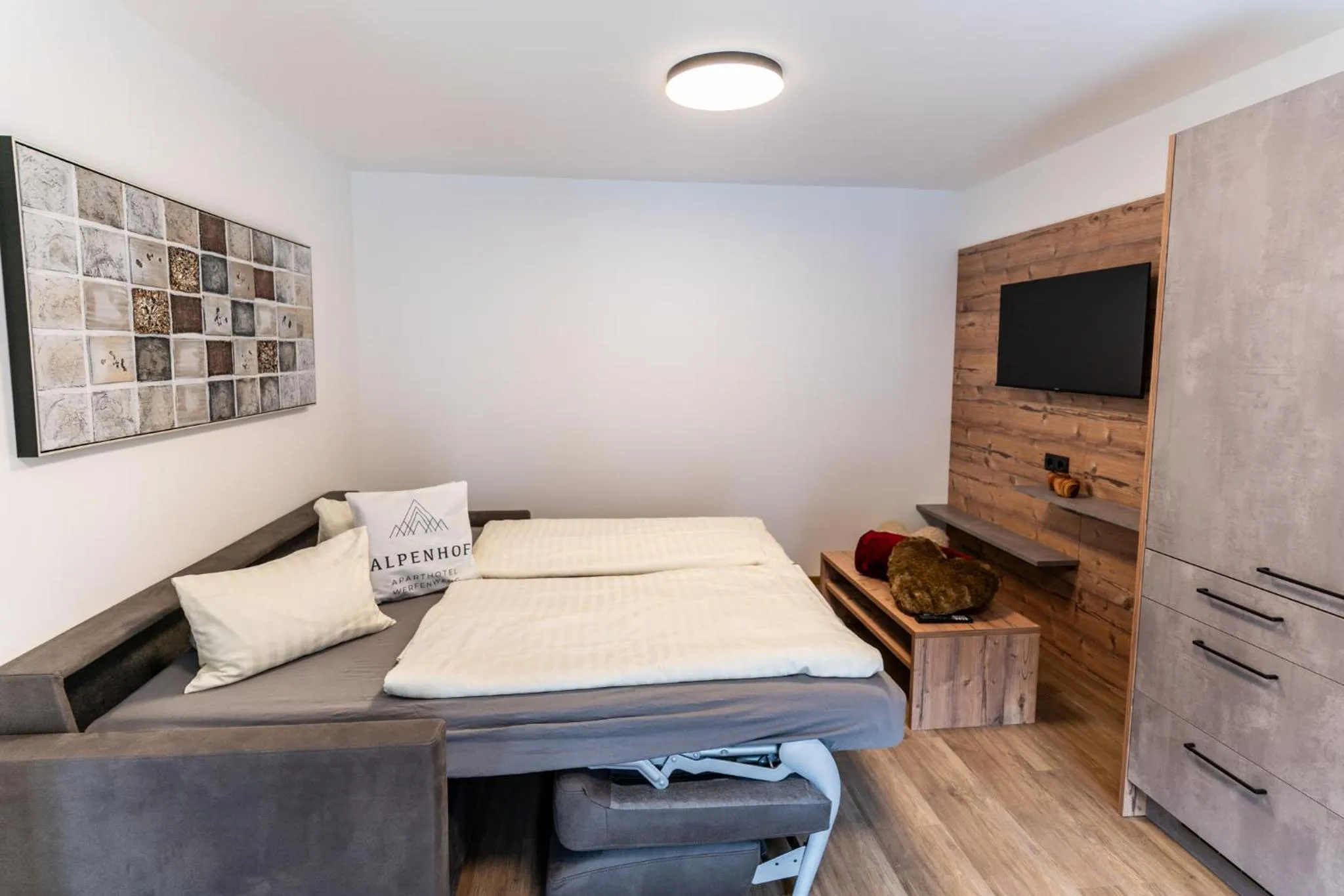 Seating area, Bed in Apart Hotel Alpenhof Werfenweng