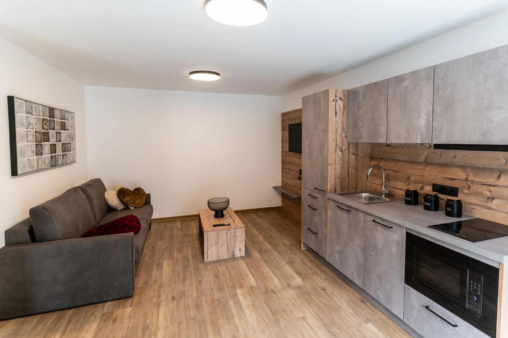 Kitchen or kitchenette in Apart Hotel Alpenhof Werfenweng