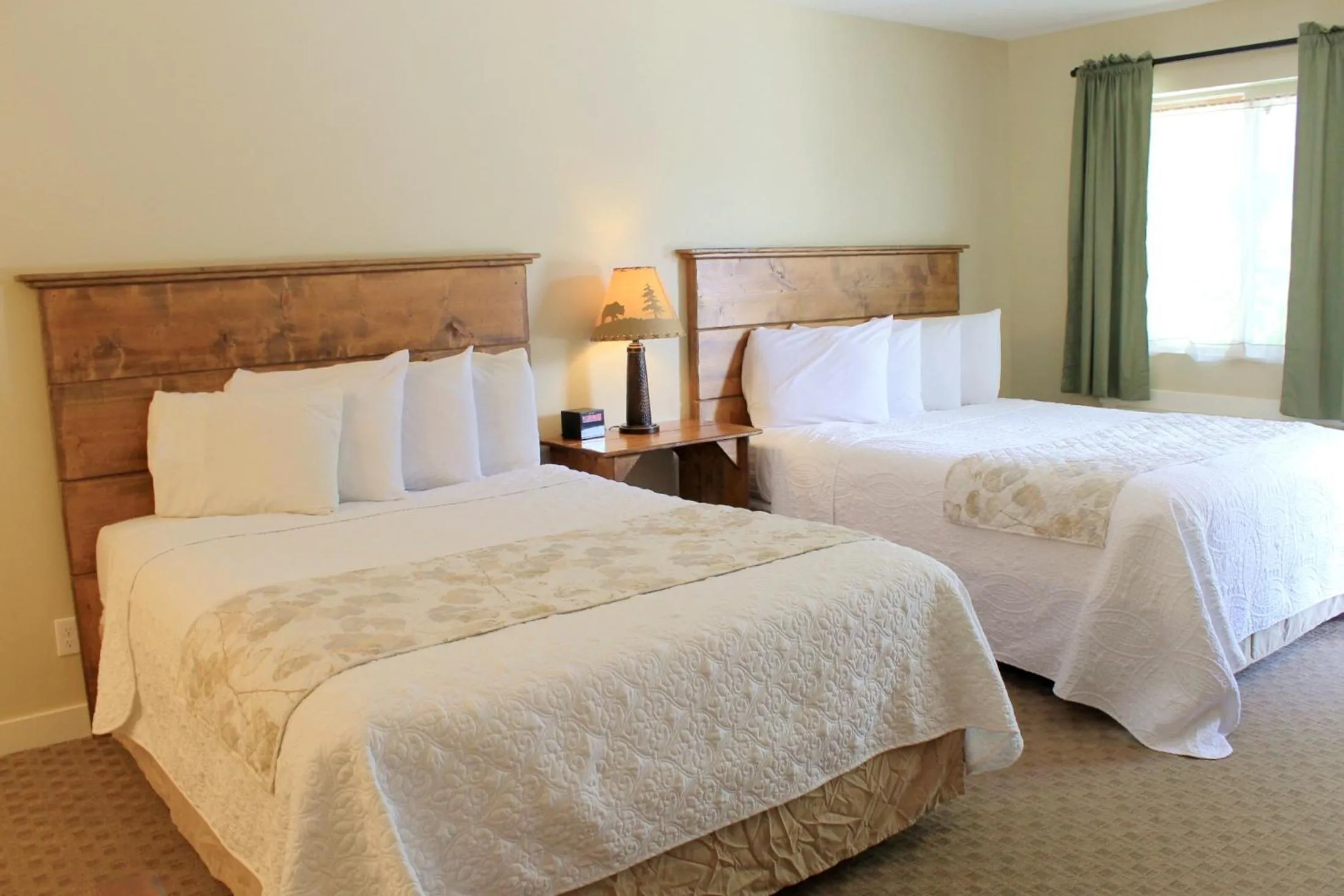 Bed in Moose Creek Inn