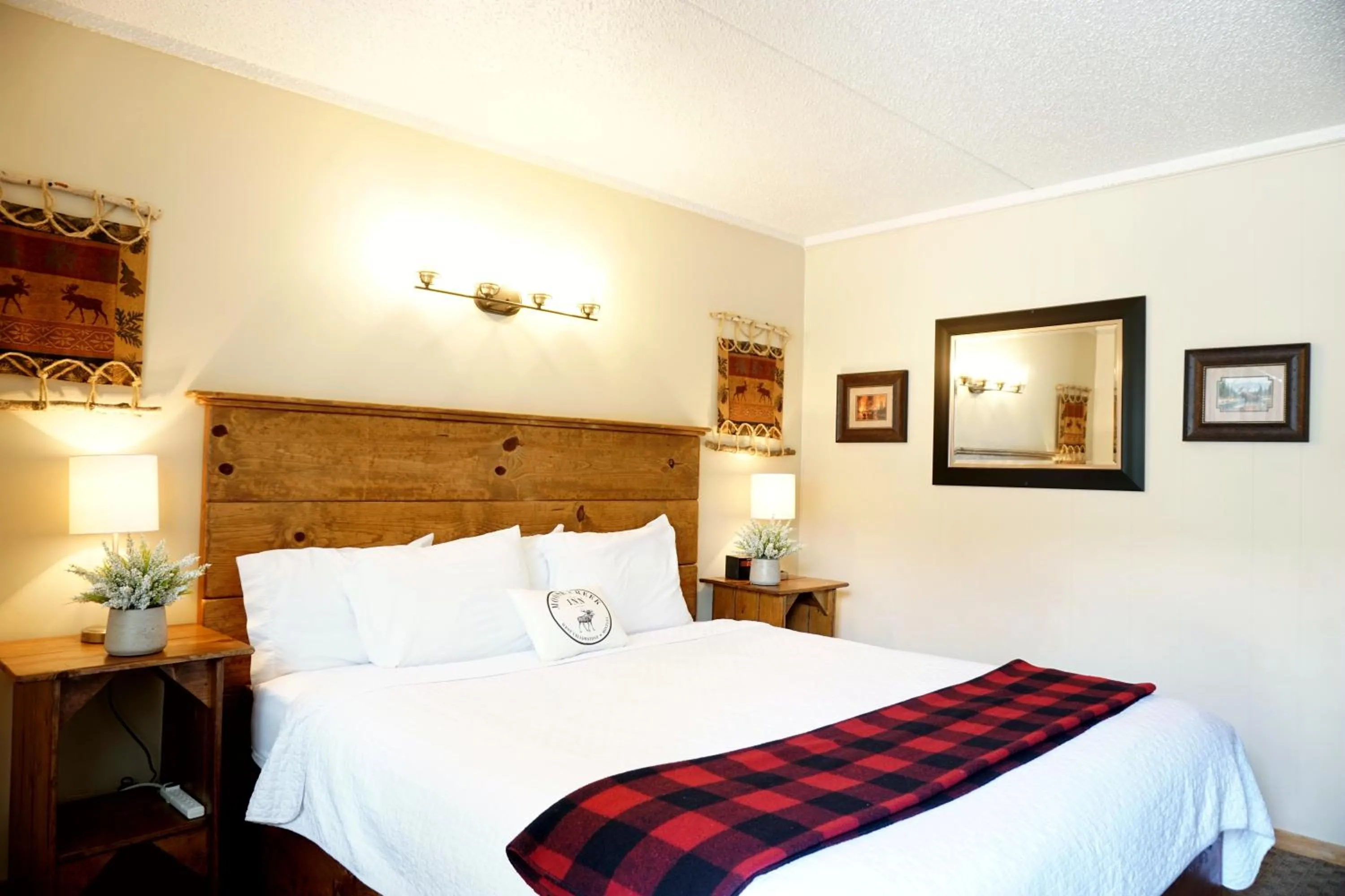 Bed in Moose Creek Inn