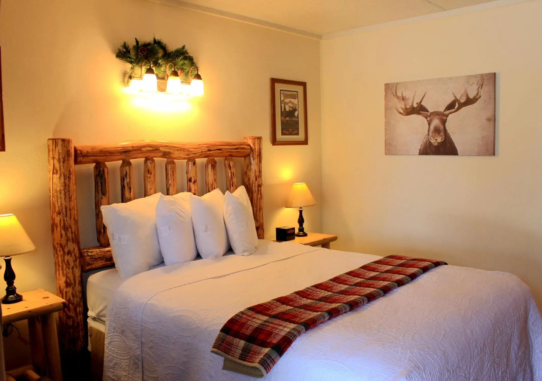 Bed in Moose Creek Inn
