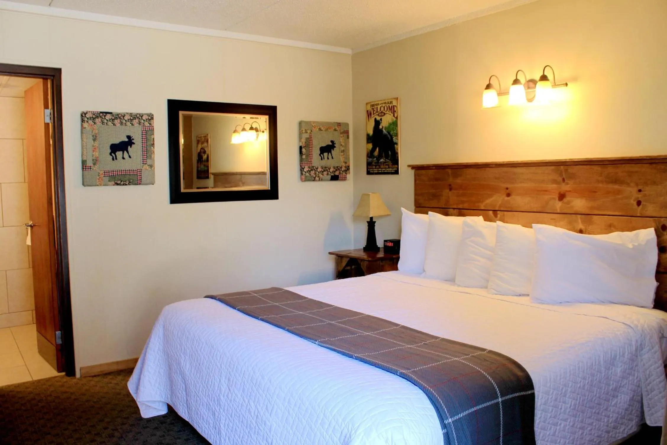 Bed in Moose Creek Inn