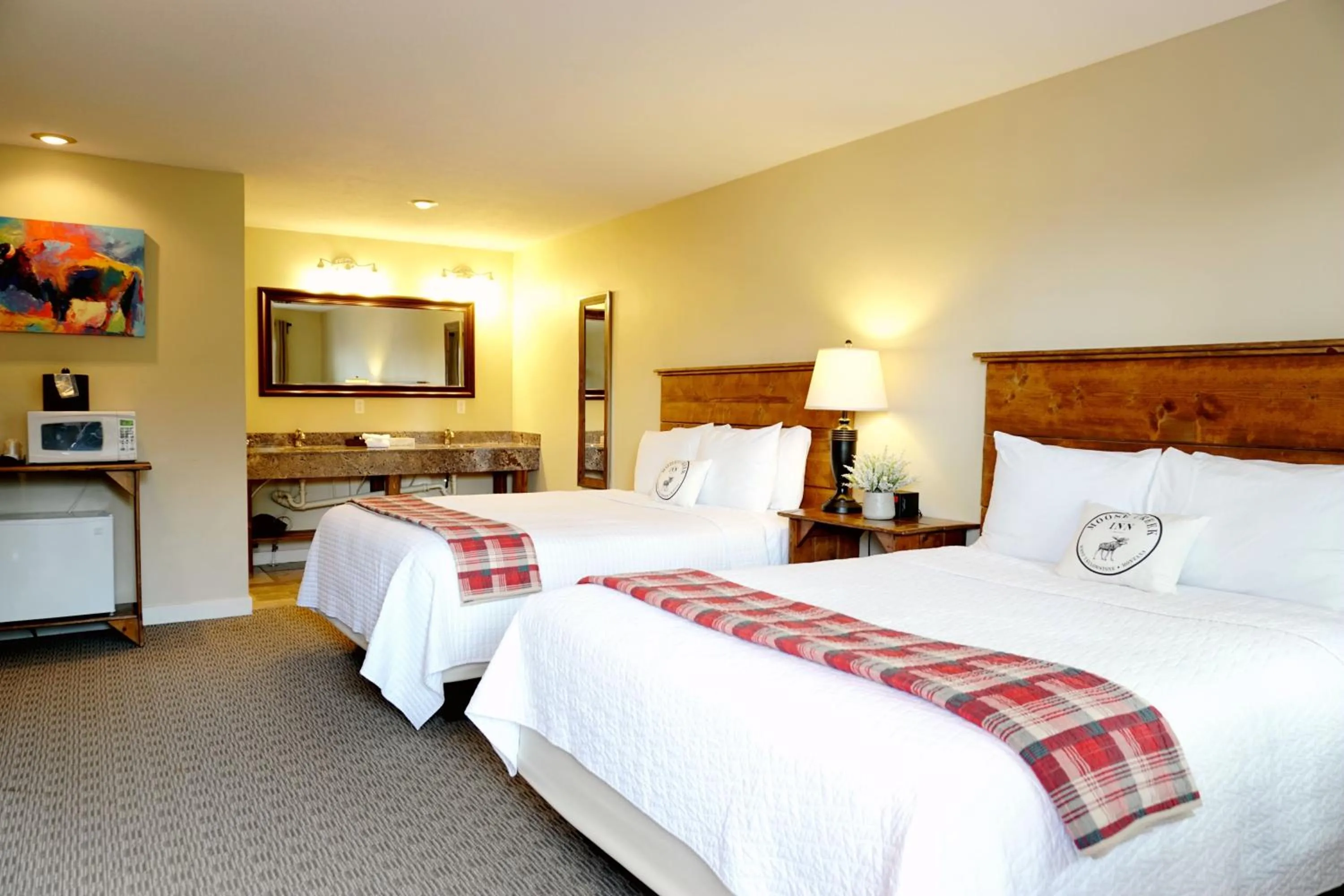 Bed in Moose Creek Inn
