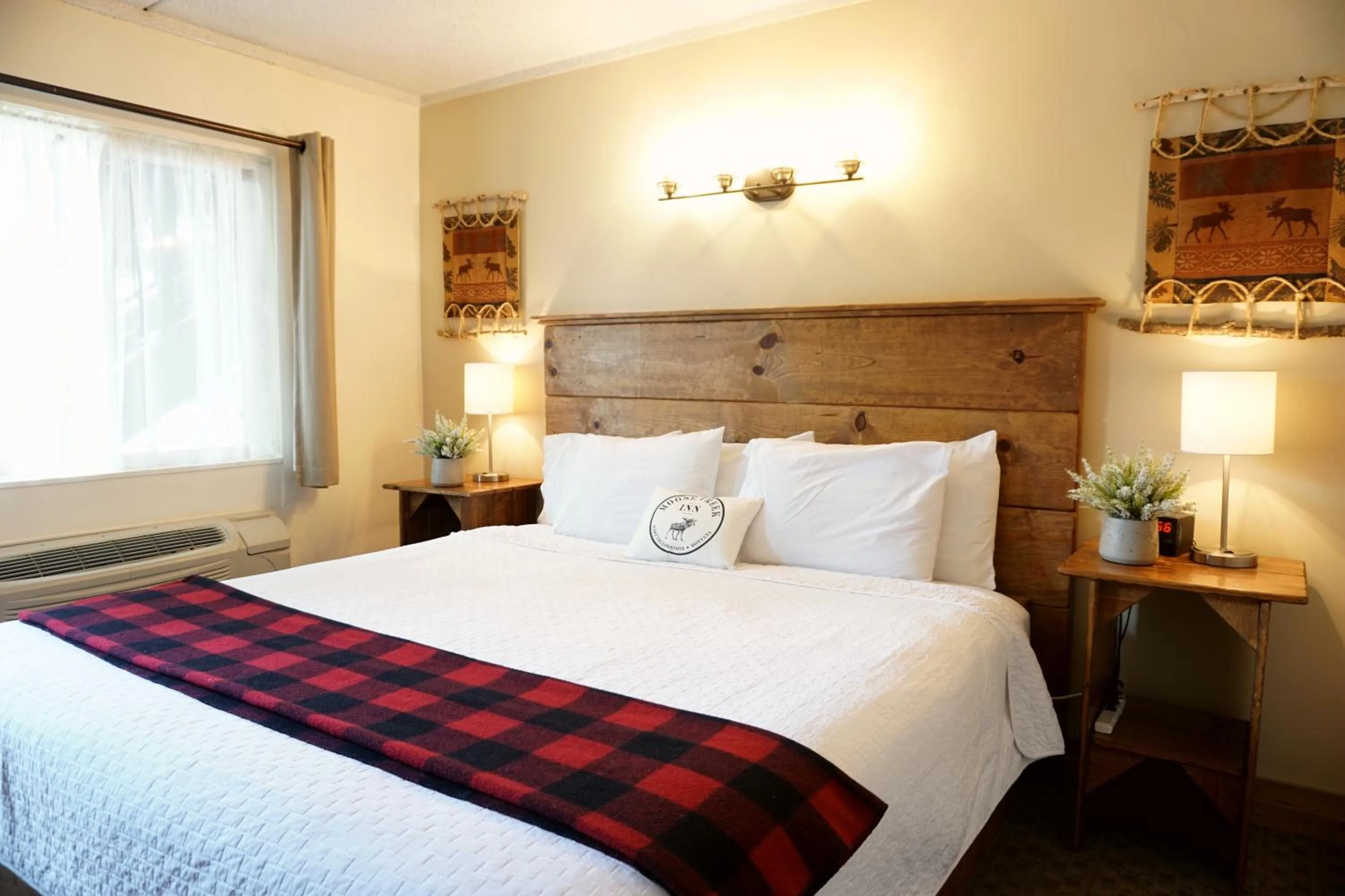 Bed in Moose Creek Inn
