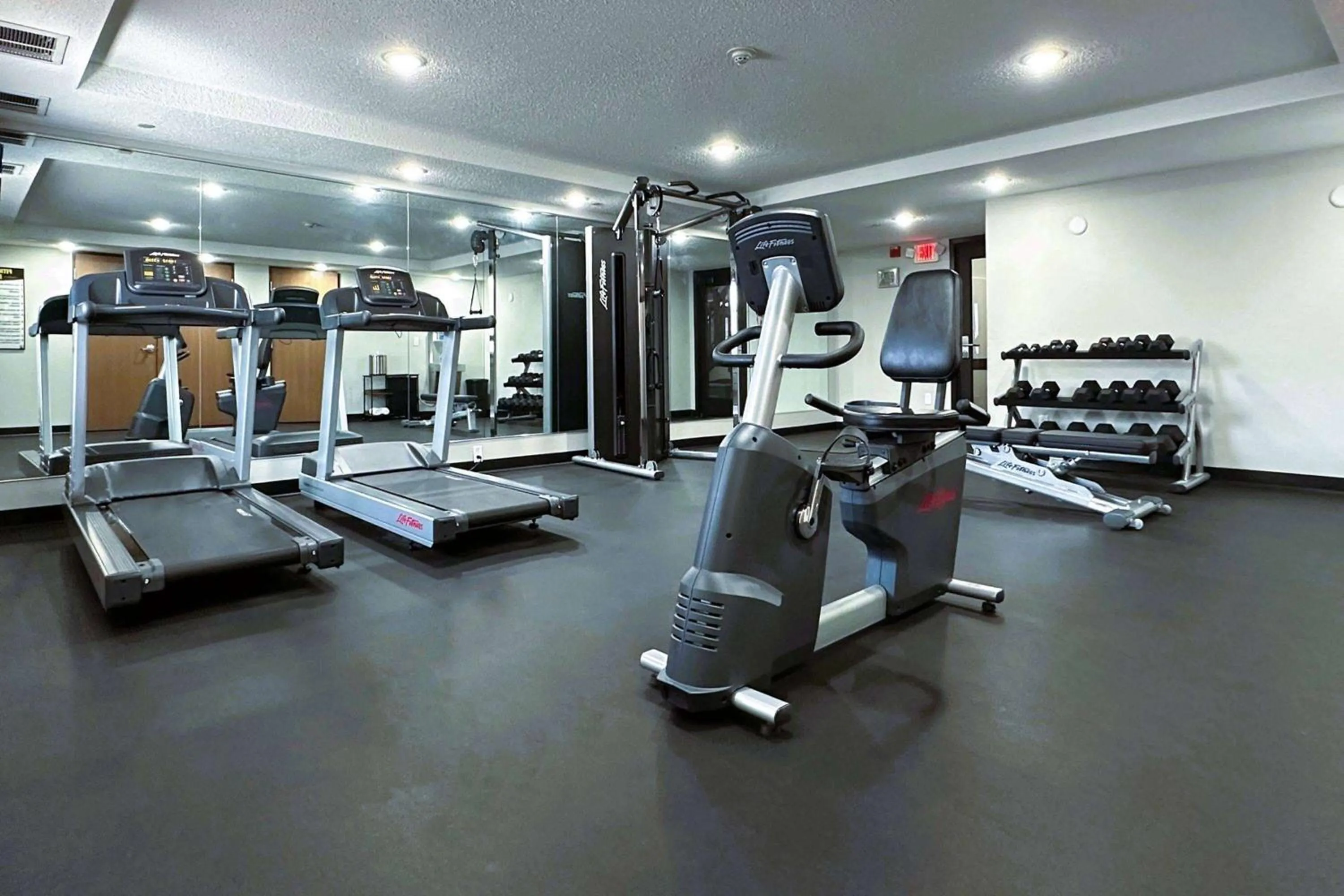 Fitness centre/facilities in AmericInn by Wyndham Menominee