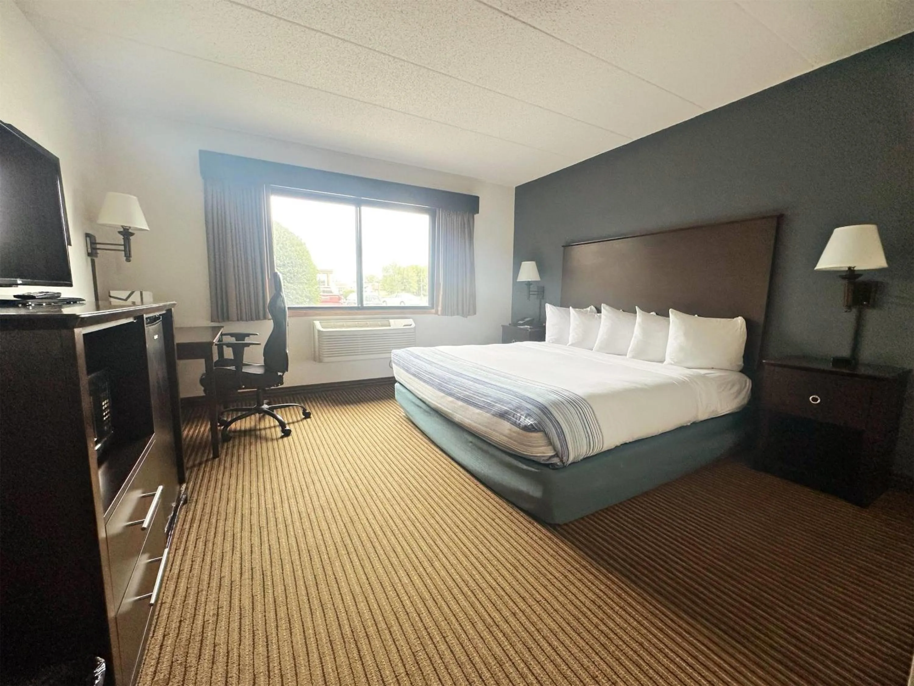 Photo of the whole room, Bed in AmericInn by Wyndham Menominee