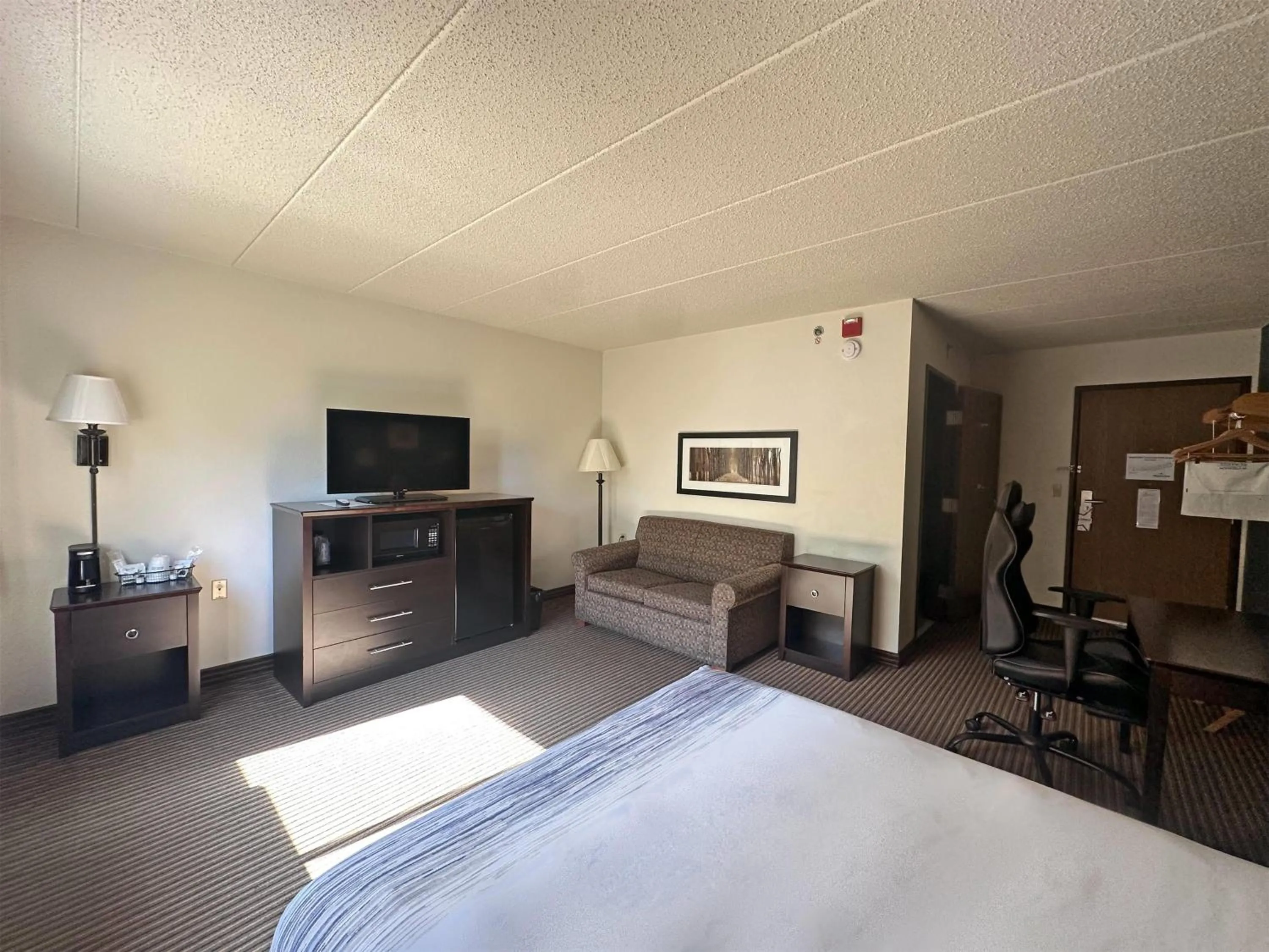 Photo of the whole room, Bed in AmericInn by Wyndham Menominee