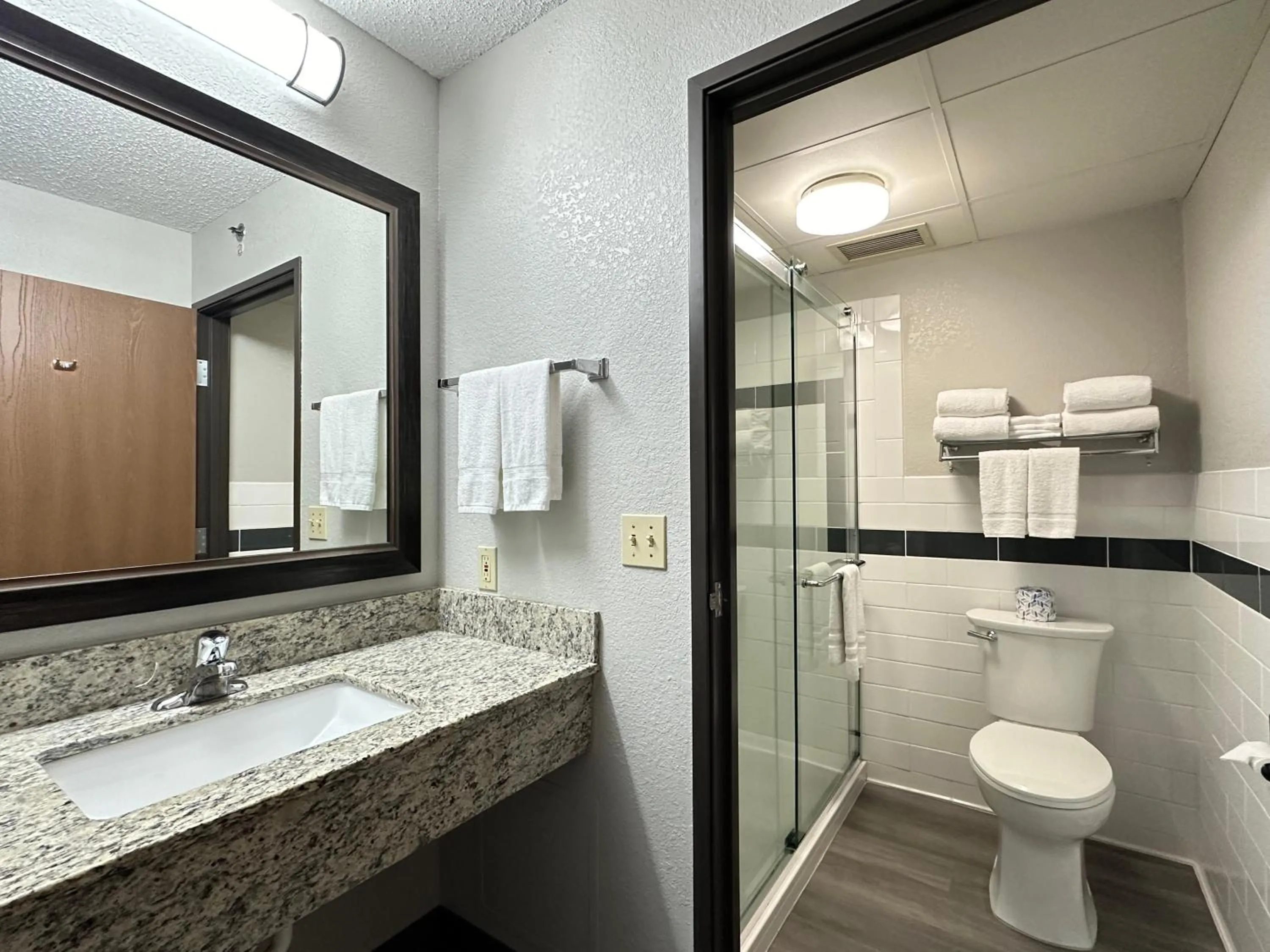 Shower in AmericInn by Wyndham Menominee