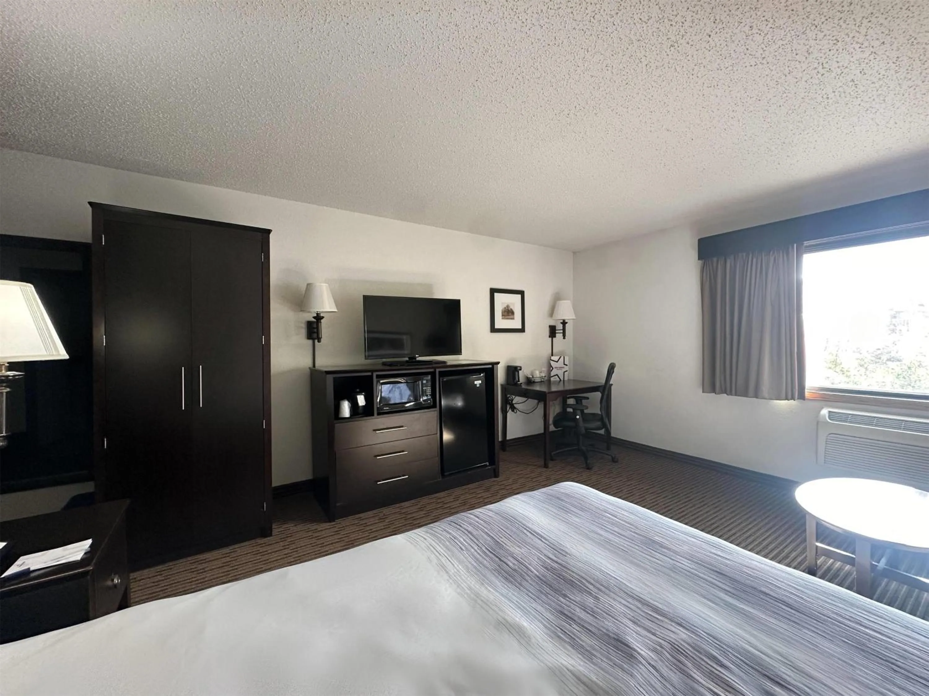 Photo of the whole room, Bed in AmericInn by Wyndham Menominee