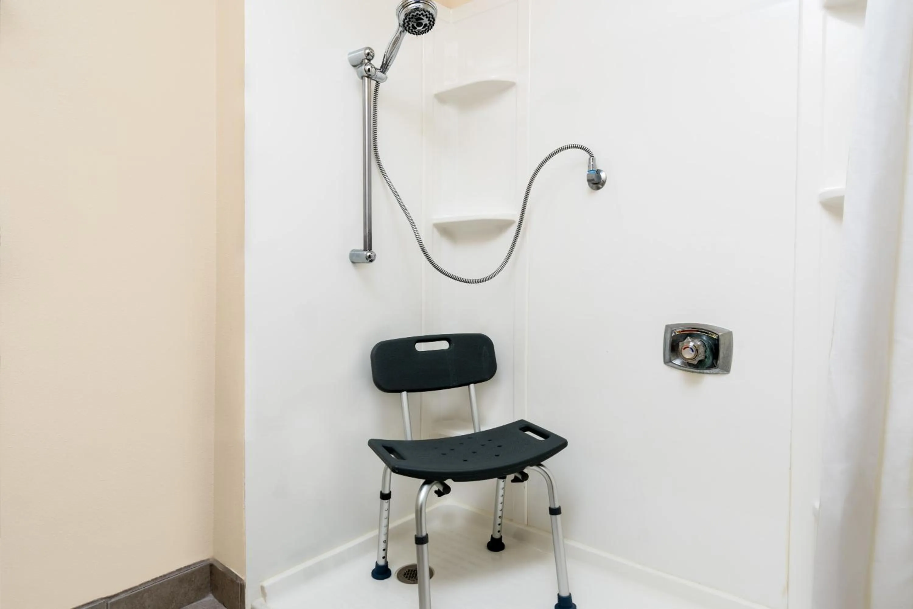 Bathroom in Super 8 by Wyndham Rochester Mayo Clinic Area