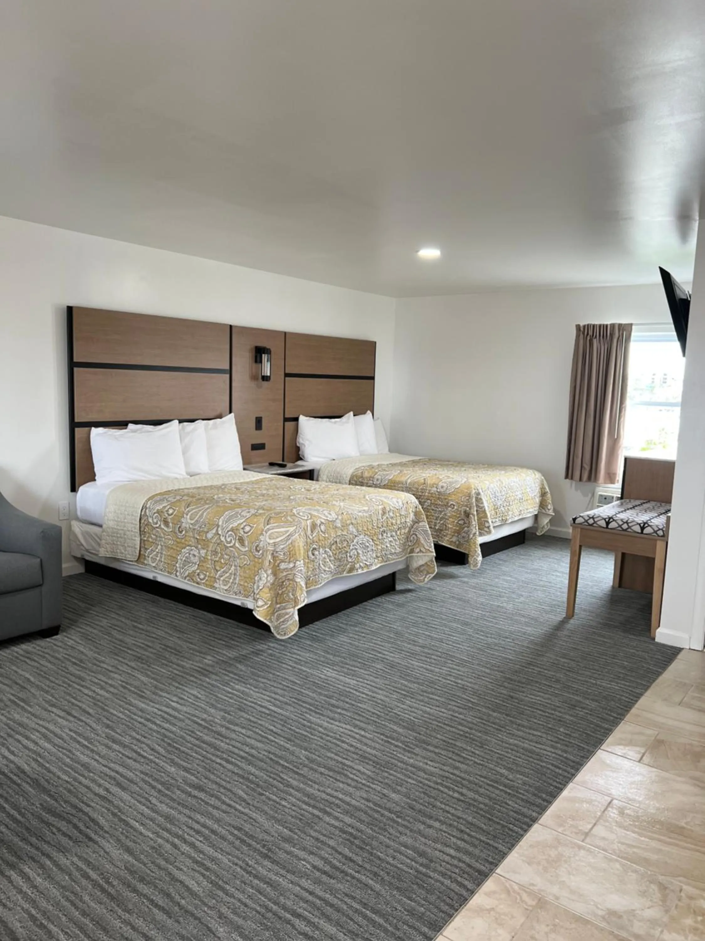 Bed in Crystal Sands Motel