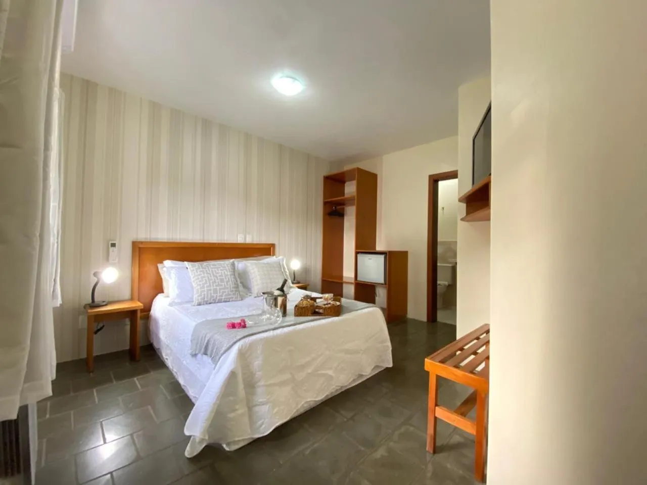 Bed in Pousada Flor De Canela