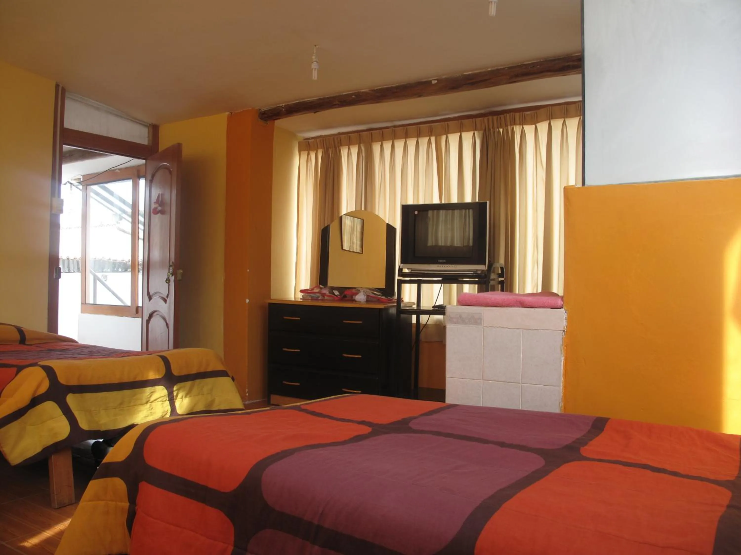 Photo of the whole room, Bed in Casa de Mama Cusco 2-The Ecohouse