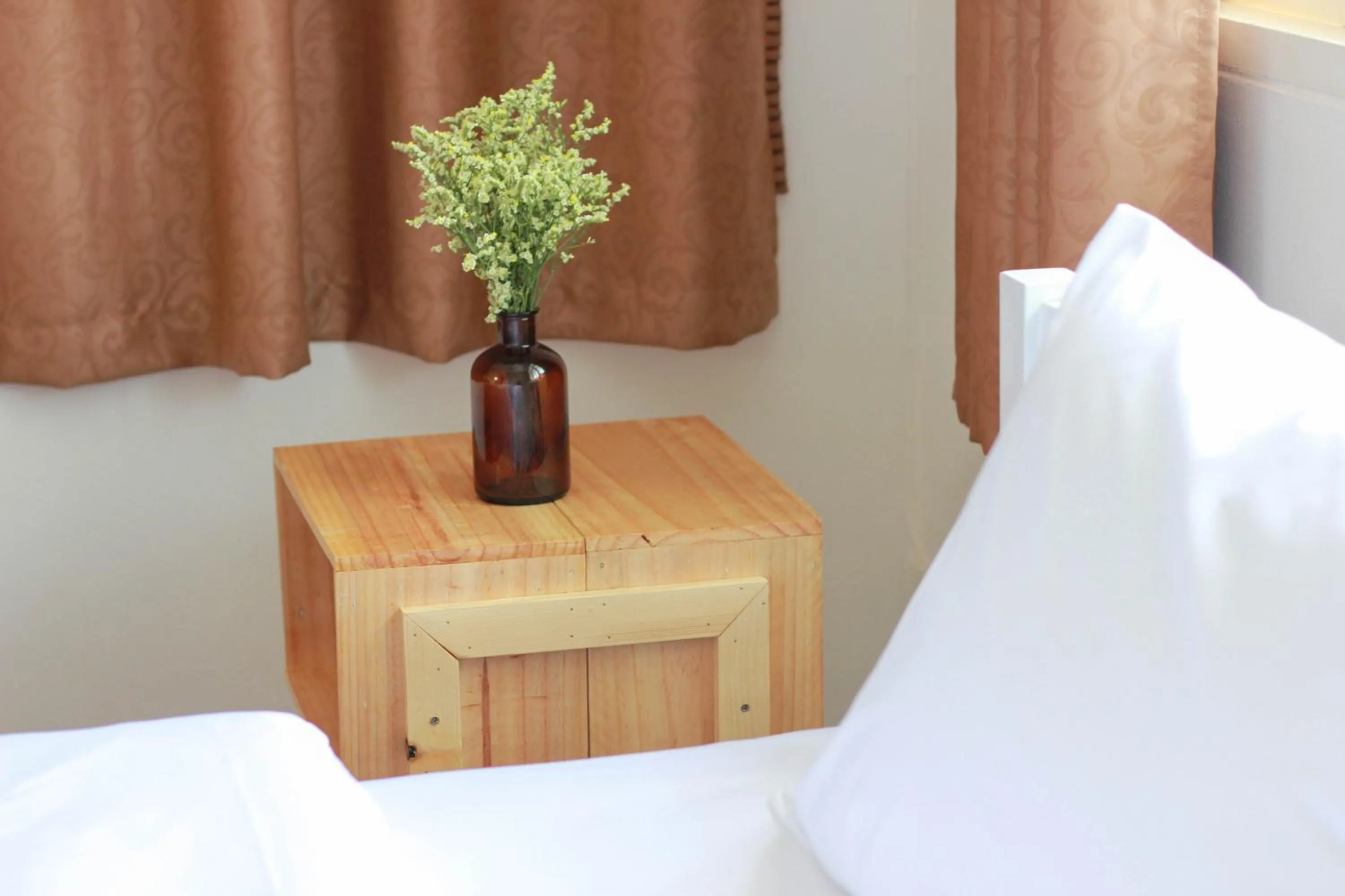 Bed in HOME@HOSTEL KANCHANABURI