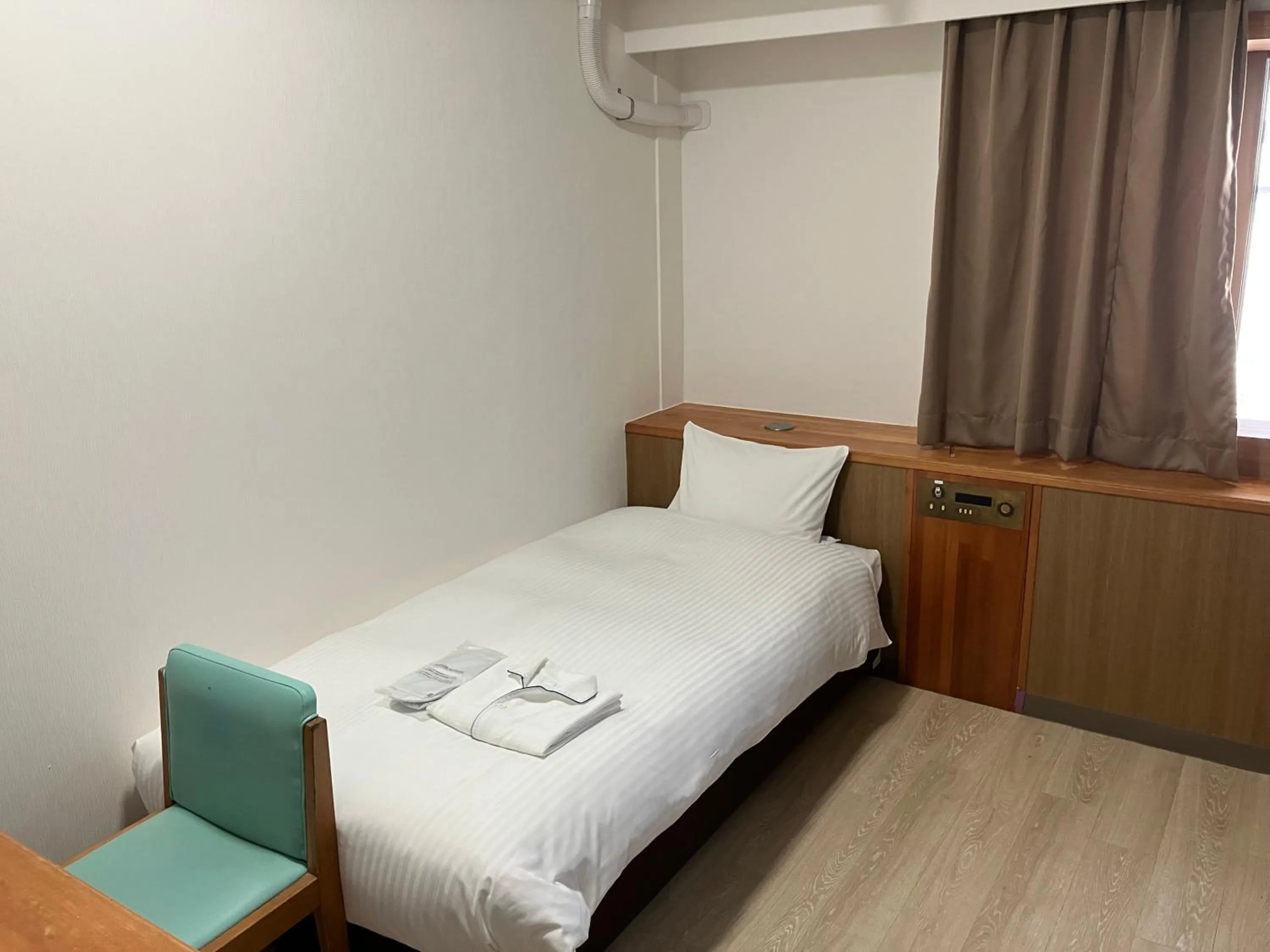 Bed in Enagic Okinawa Kokusai Plaza Hotel