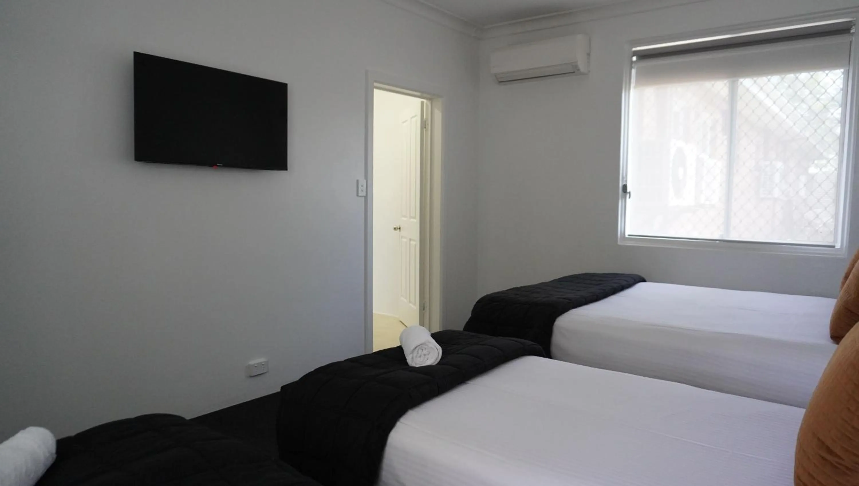 Bed in Abbotsleigh Motor Inn