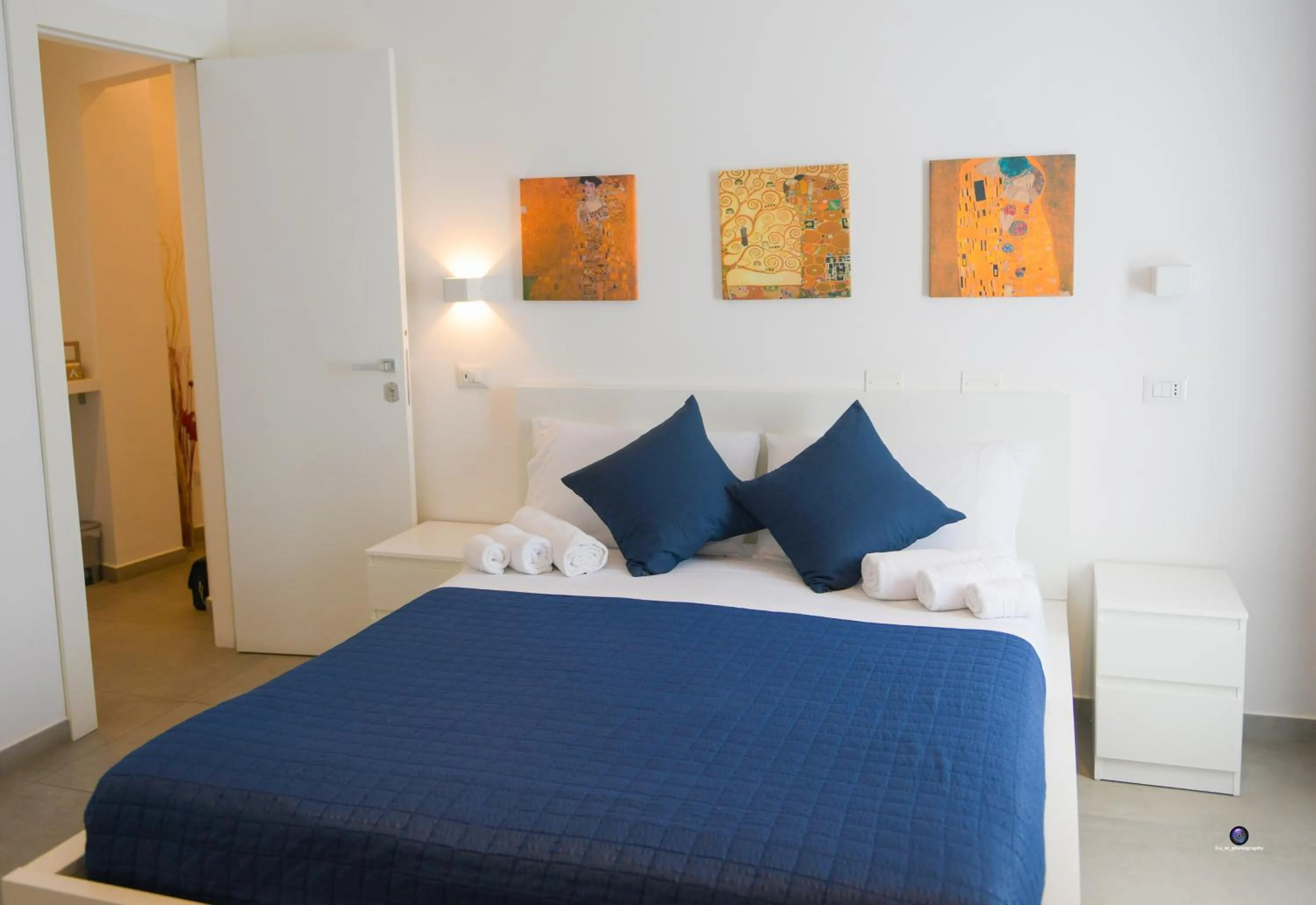 Bed in Palazzo Verdi Holiday Viterbo