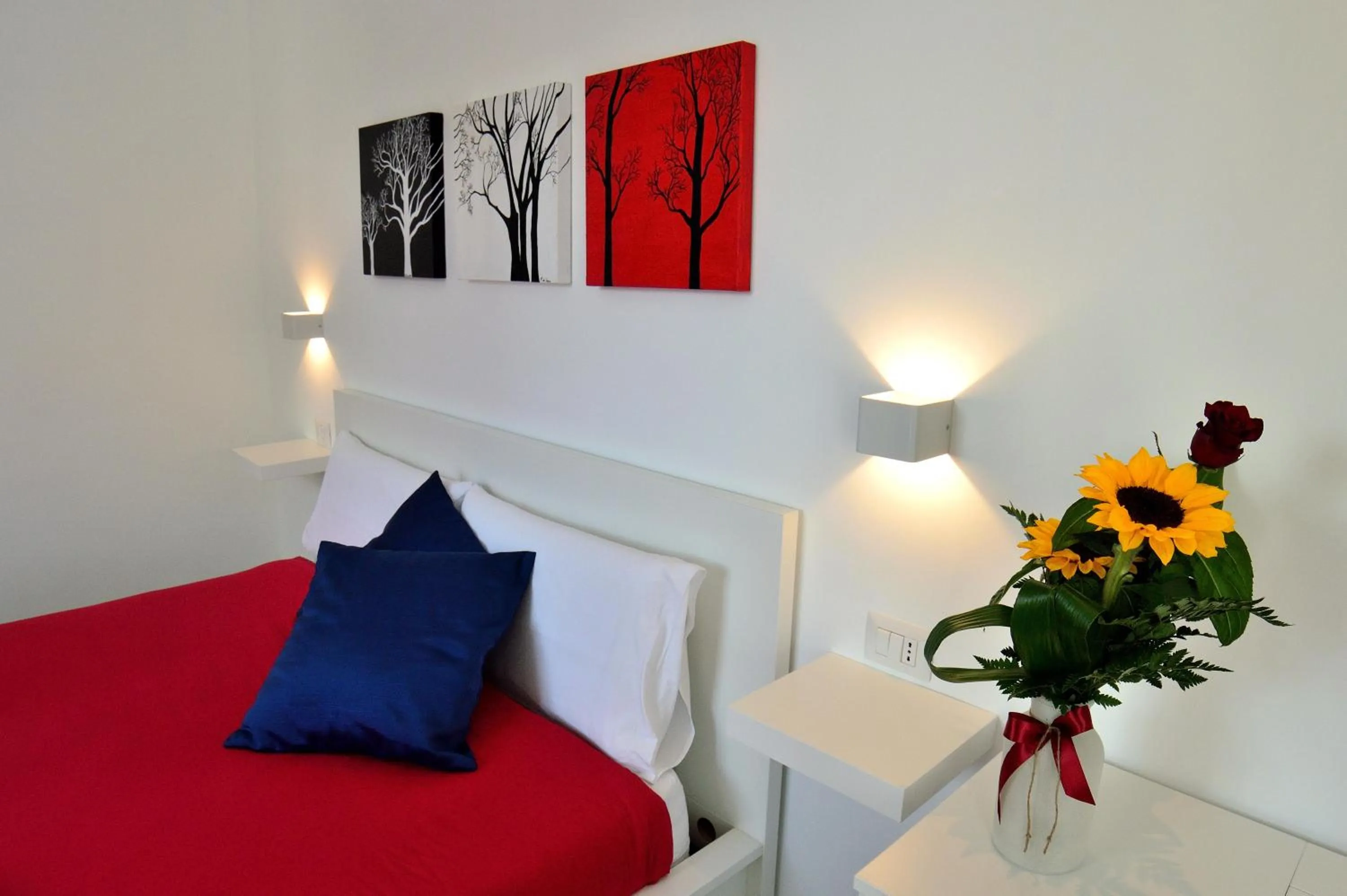 Bed in Palazzo Verdi Holiday Viterbo