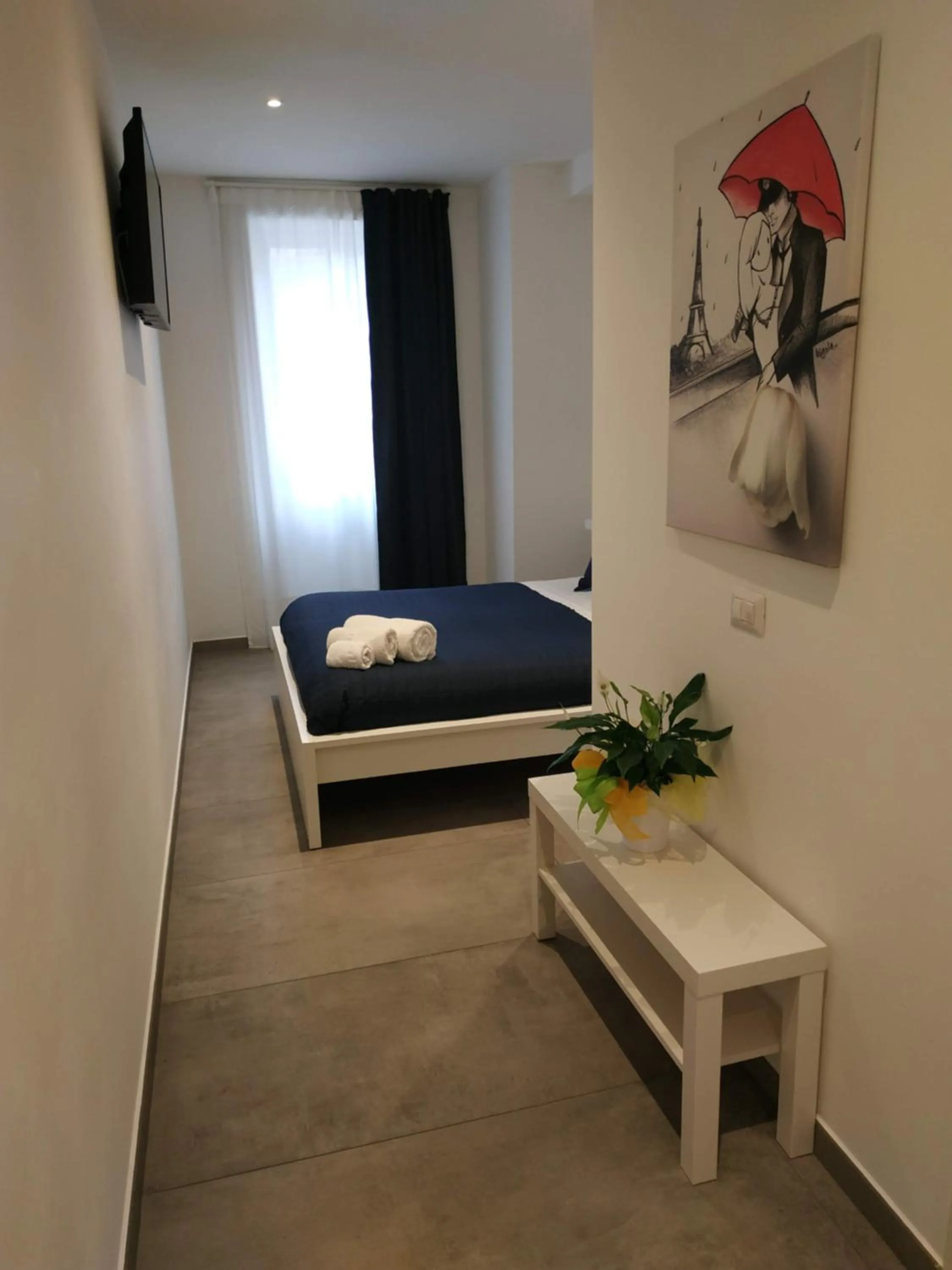 Bed in Palazzo Verdi Holiday Viterbo