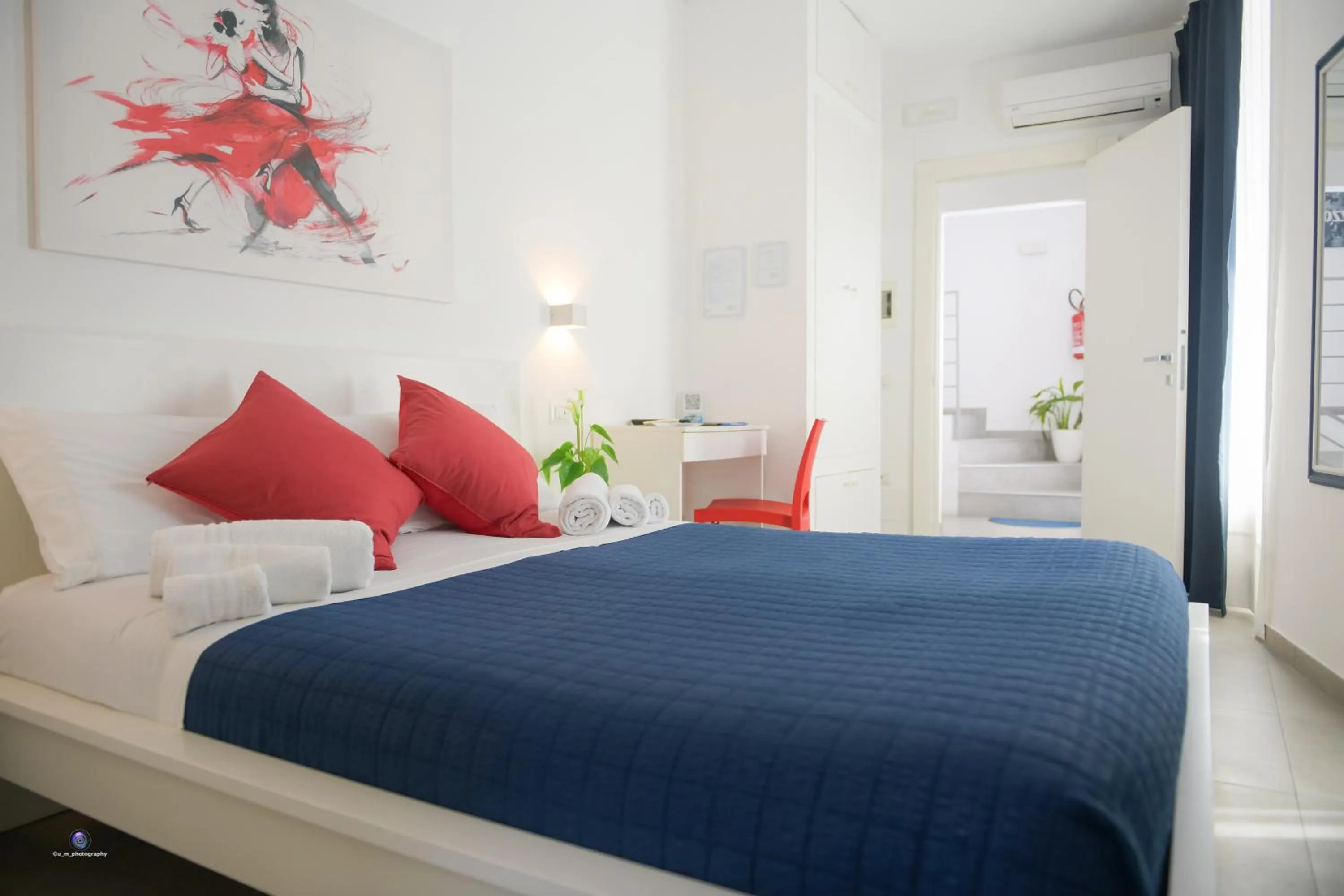 Bed in Palazzo Verdi Holiday Viterbo