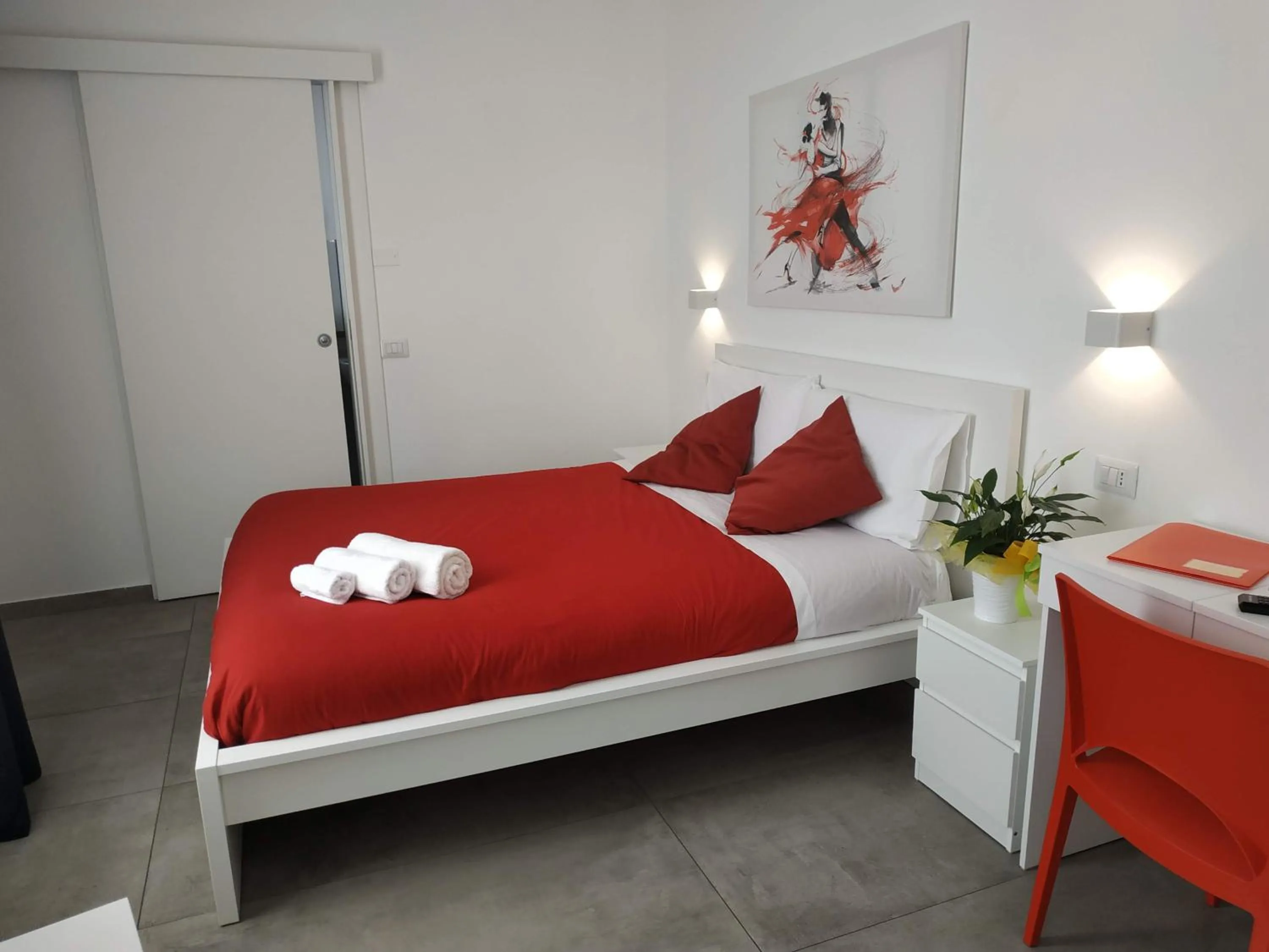 Bed in Palazzo Verdi Holiday Viterbo