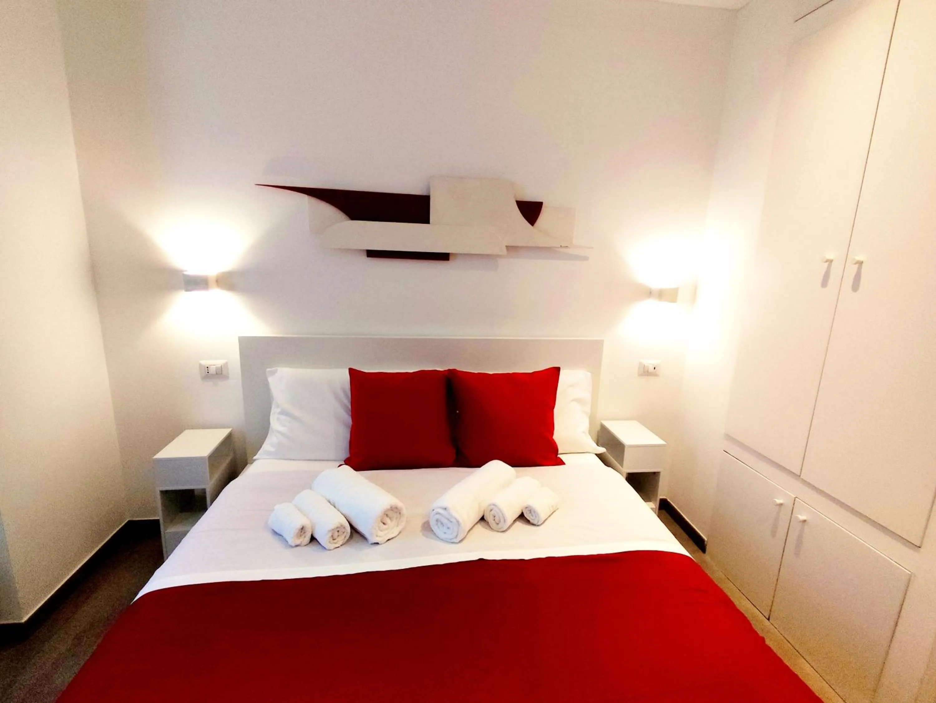 Bed in Palazzo Verdi Holiday Viterbo