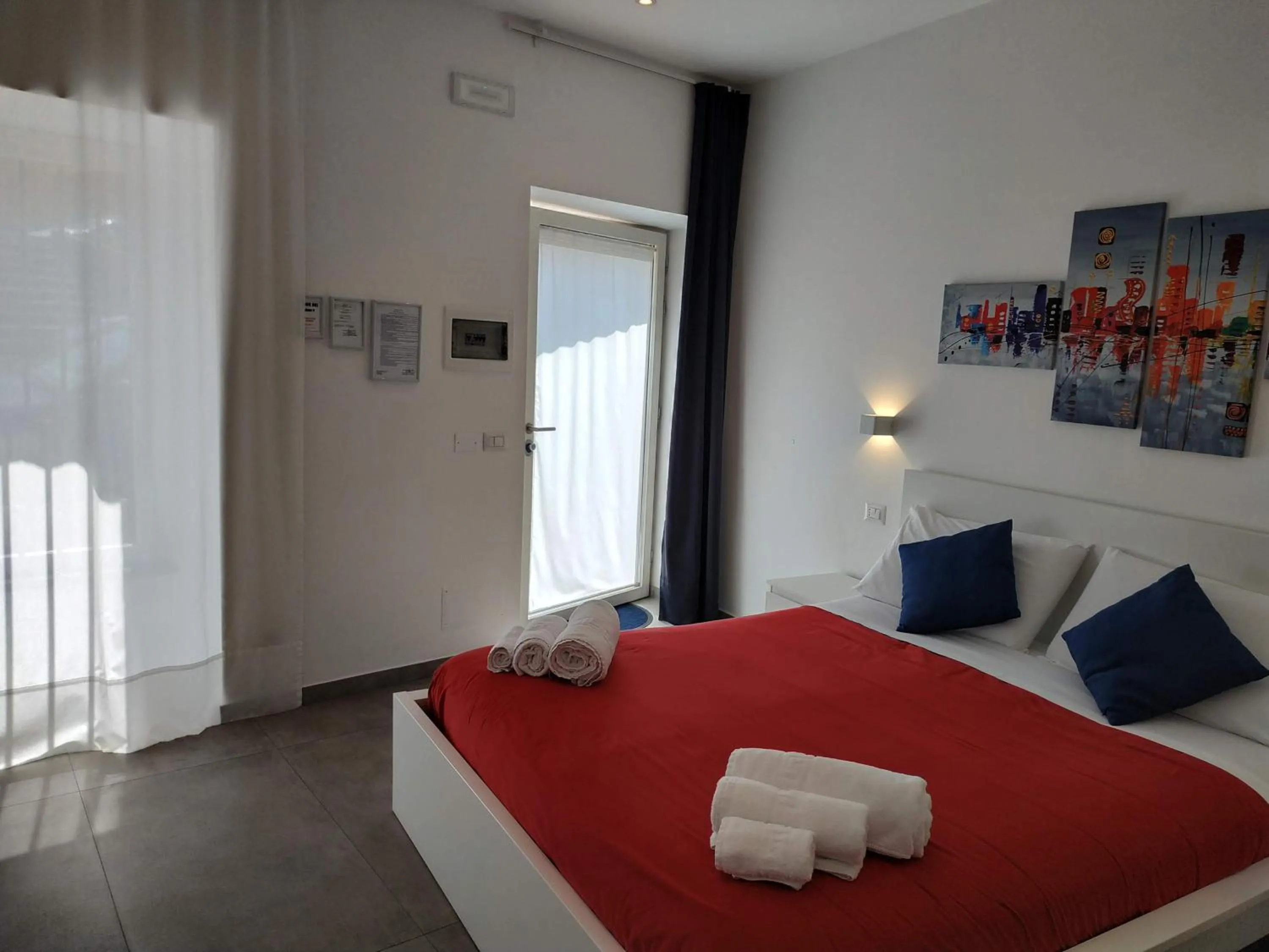 Bed in Palazzo Verdi Holiday Viterbo