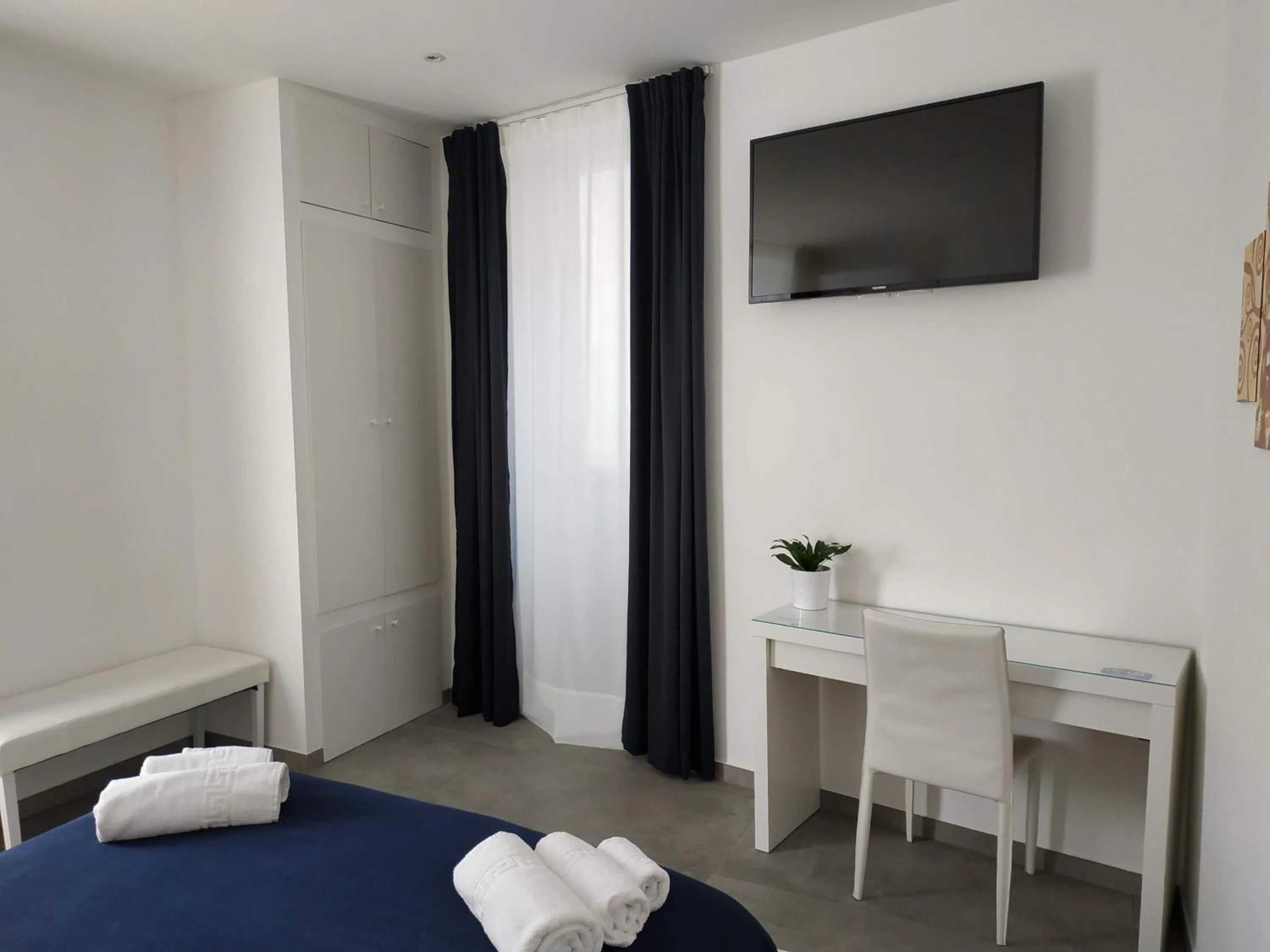 Bed in Palazzo Verdi Holiday Viterbo