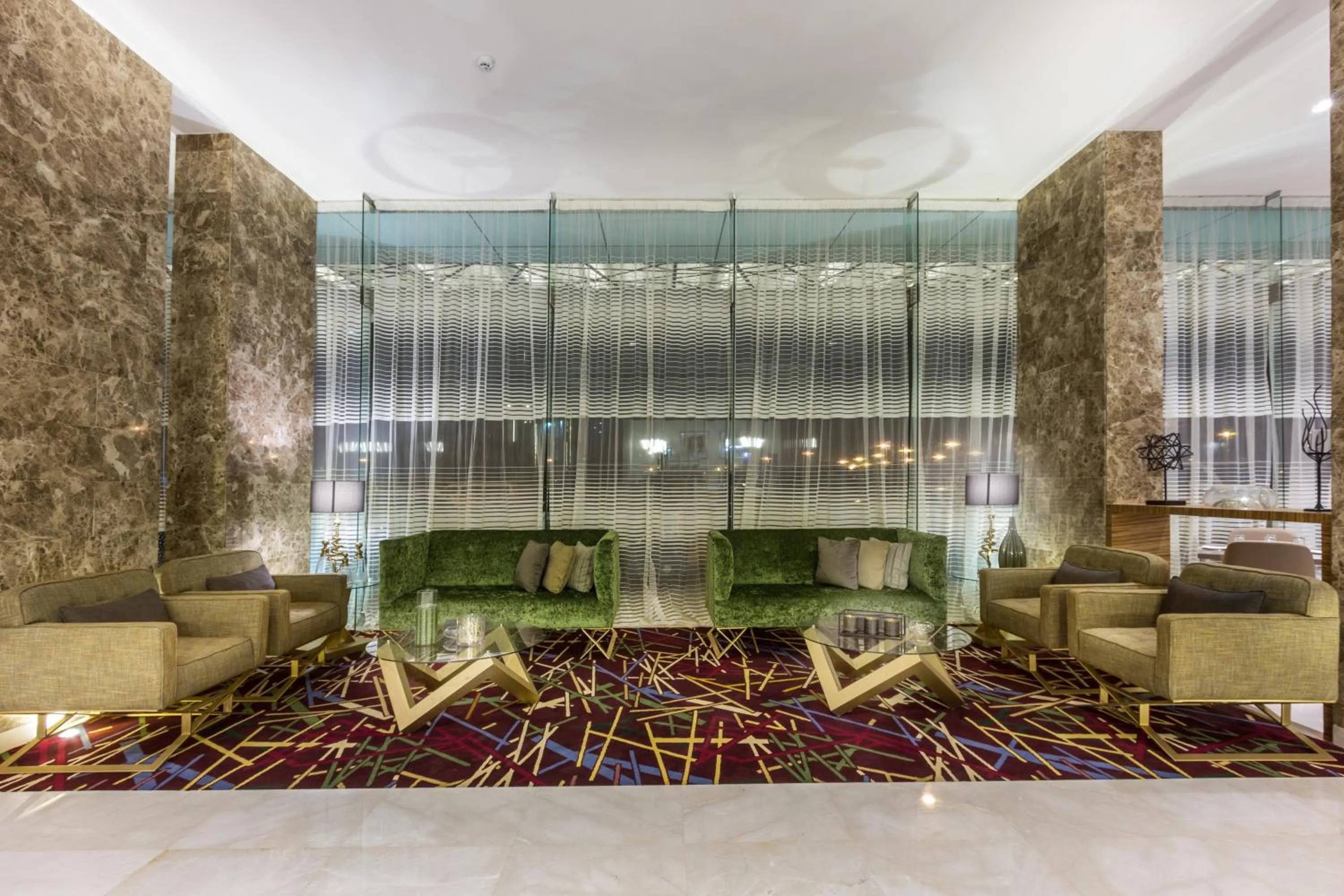 Lobby or reception in Ewaa Express Hotel - Al Hamra