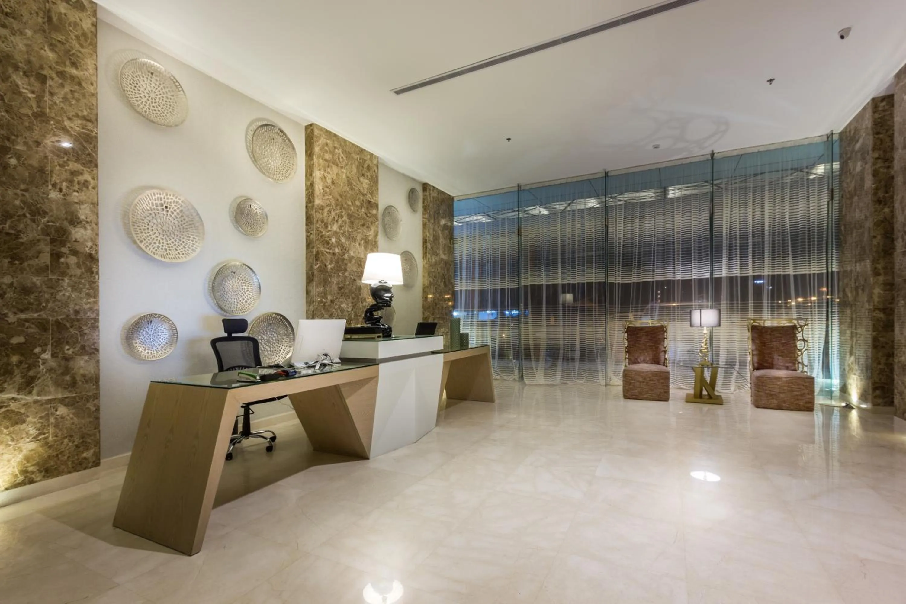 Lobby or reception in Ewaa Express Hotel - Al Hamra
