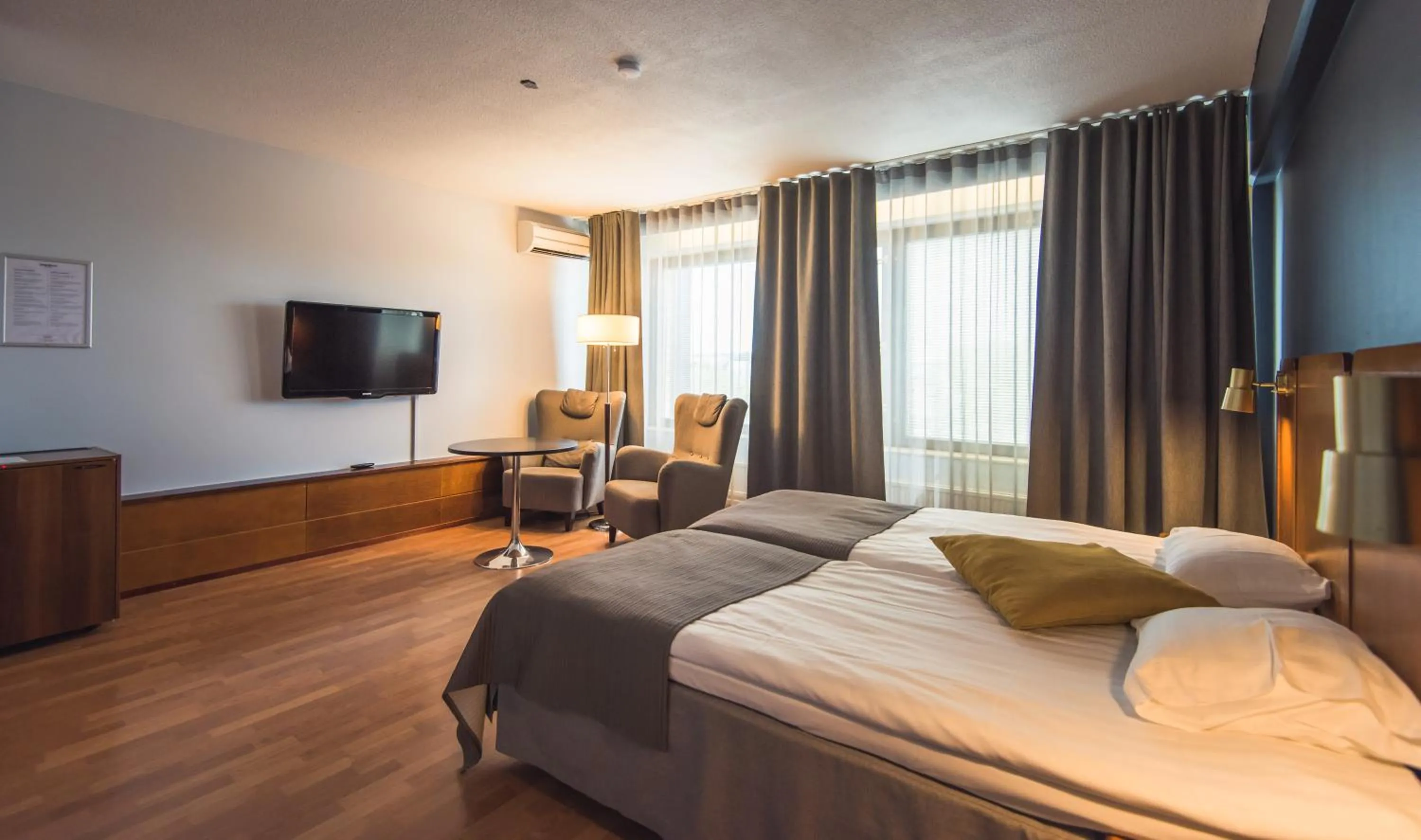 Photo of the whole room, Bed in Hotelli Seurahovi