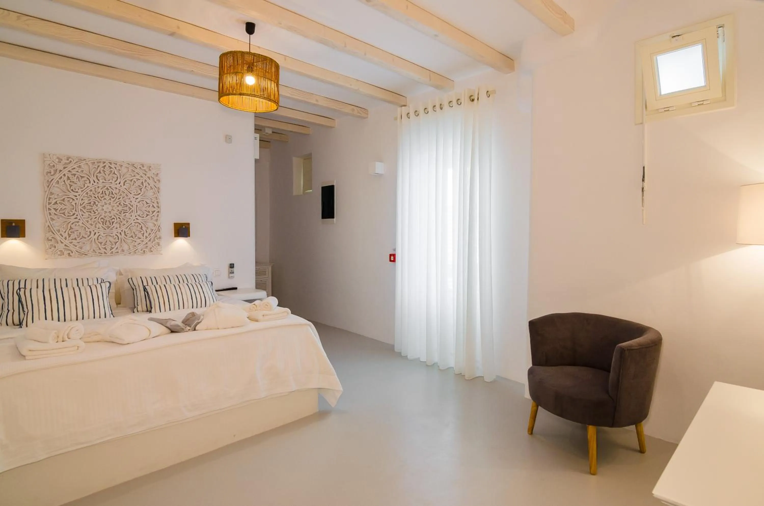 Bed in Eden View Suites & Villas