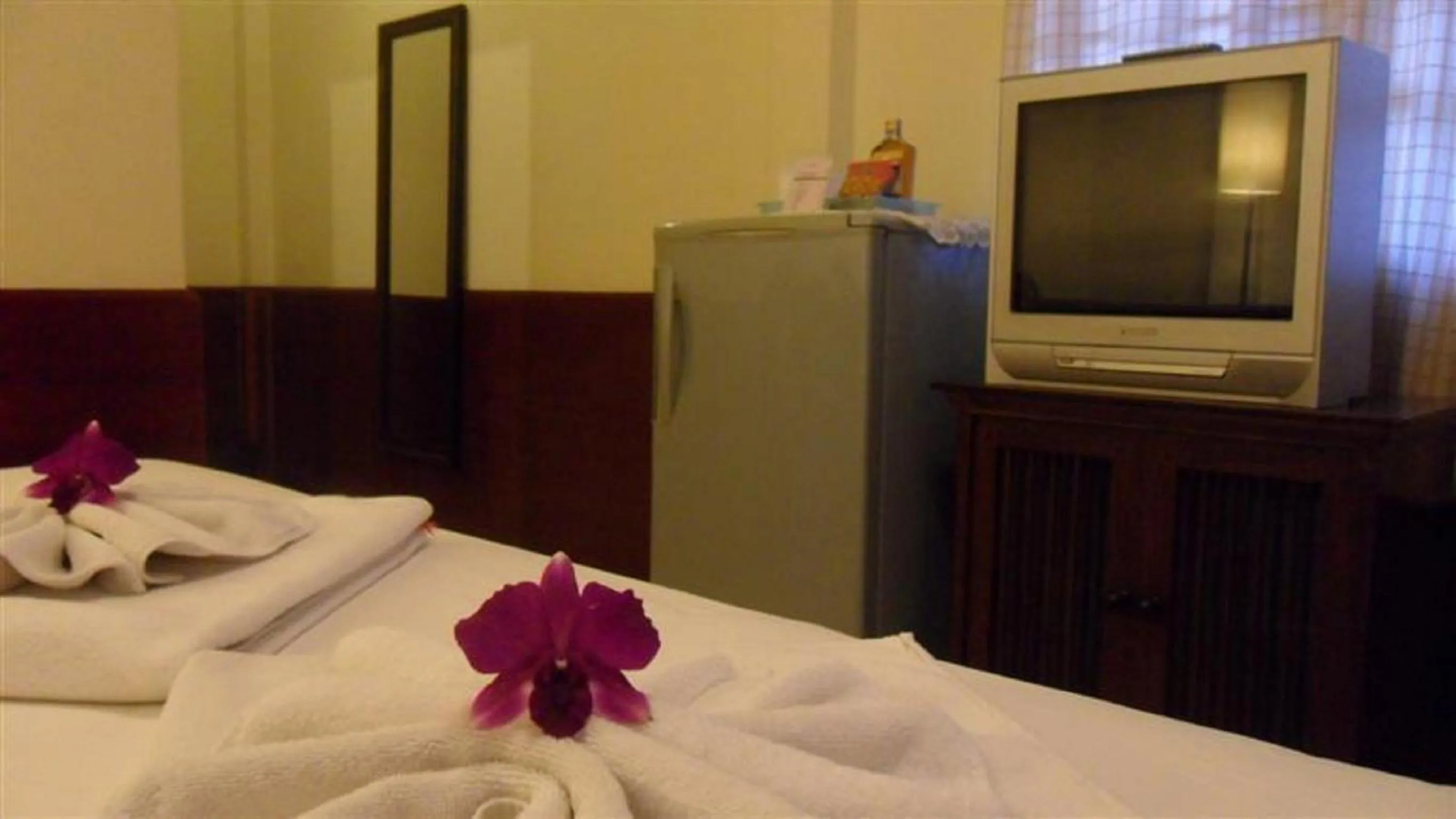 Bedroom in Baan Rom Mai Resort