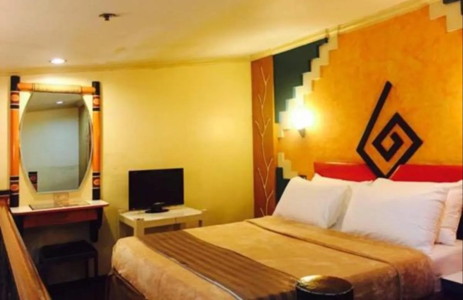 Bed in Urban Travellers Hotel