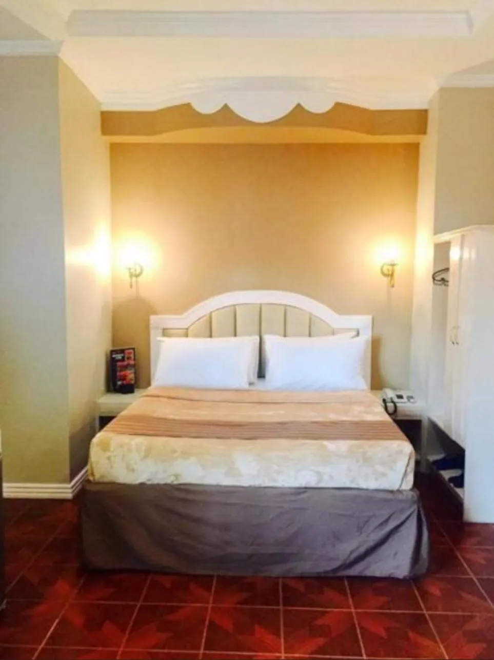 Bed in Urban Travellers Hotel