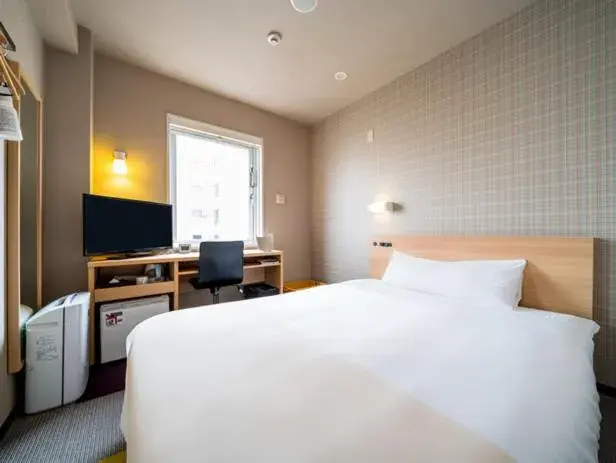 Bed in Super Hotel Takamatsu Kin en kan Bed in Super Hotel Takamatsu Kin en kan
