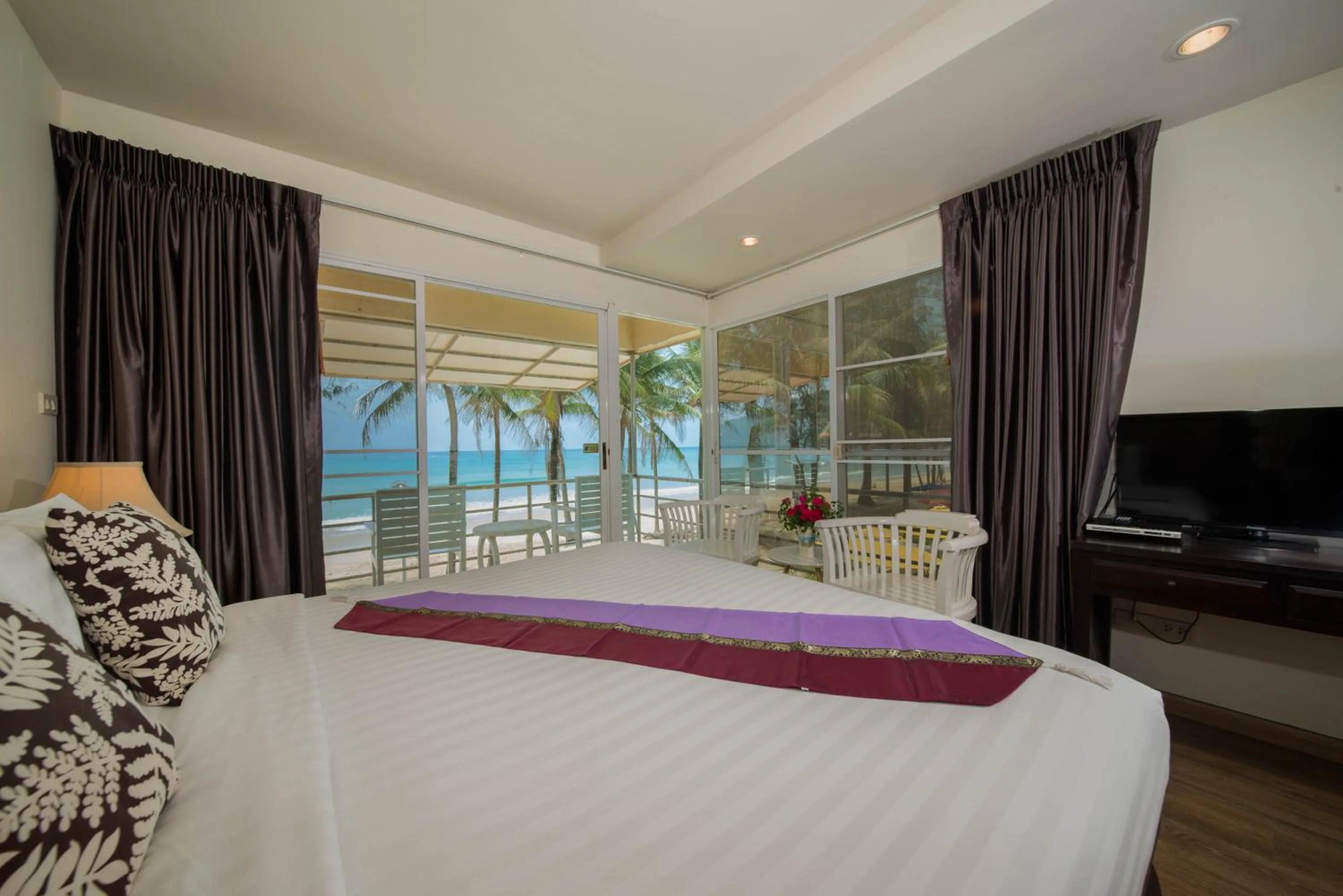 Bed in Kamala Beachfront Apartment